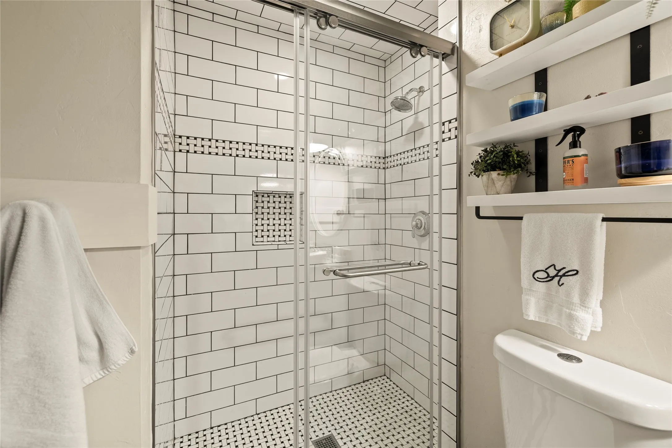 Remodeled full bath on the main floor is as pretty as it looks & sparkling clean!