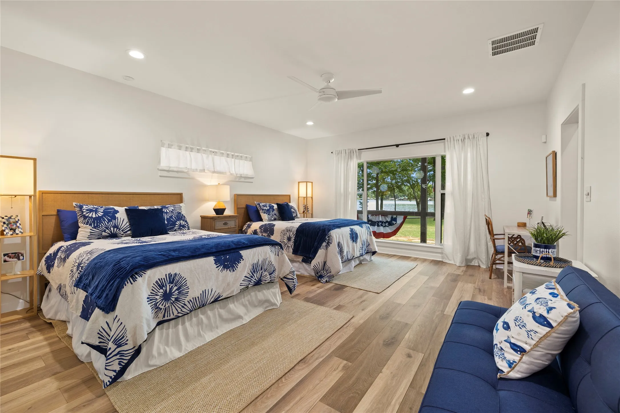 Double king beds in the second cottage bedroom. Both bedrooms have lake views to wake up to!