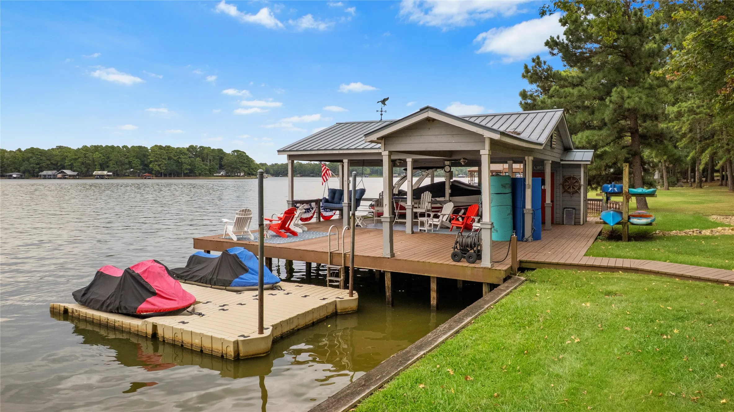 Plenty of time this Fall season to enjoy "lake toys" -- kayaks, personal floats, lilypad float, fishing poles......whatever your heart desires!  Boat, jet skis & single trailer available for separate purchase.