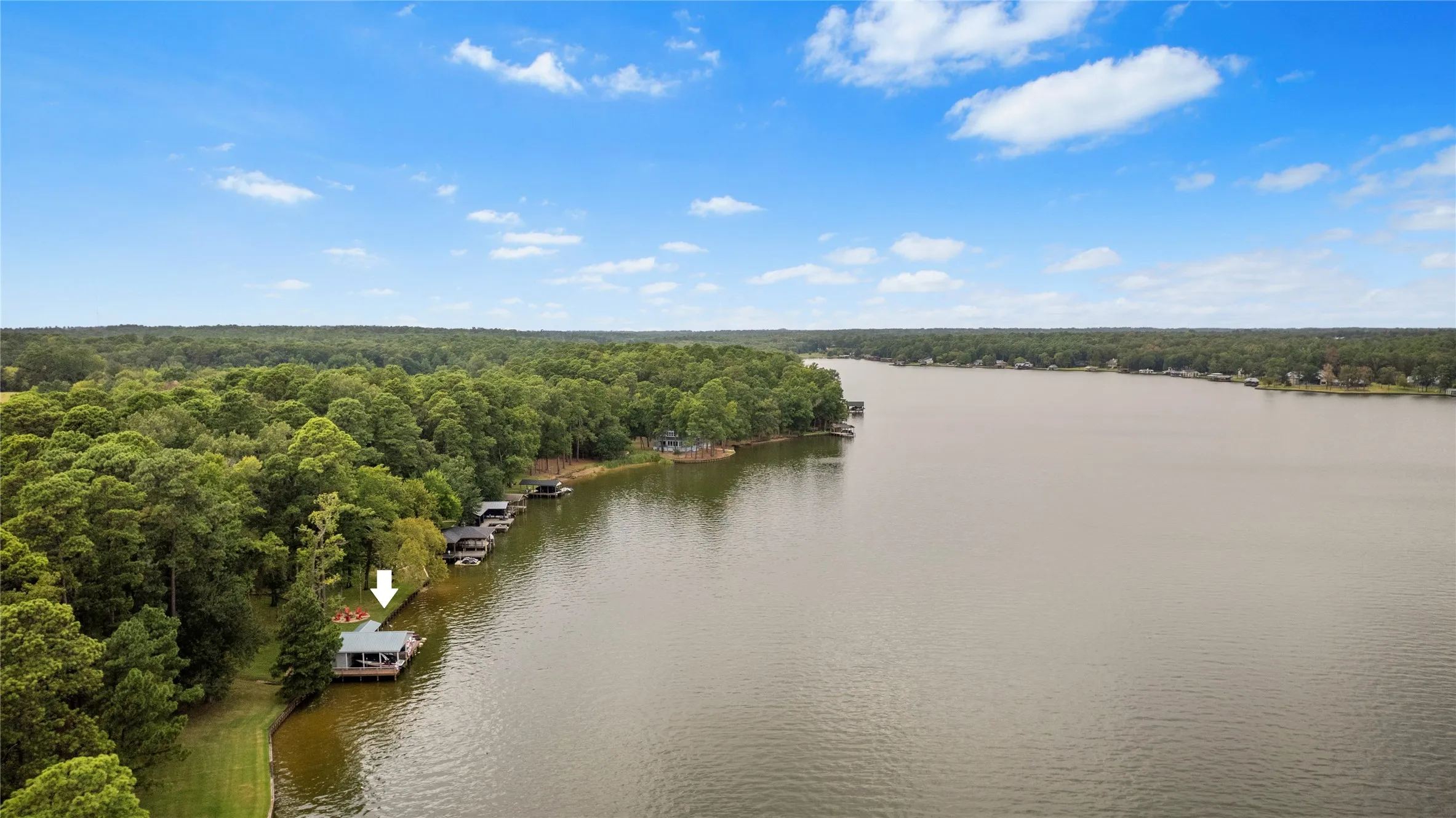 Sweeping wide-water views capture morning sun, afternoon shade. Gather around the backyard firepit on chilly days & nights too.  Make this stunning lakefront compound on a spectacular 1.61 acre double lot your next slice of heaven on Lake Cypress Springs.