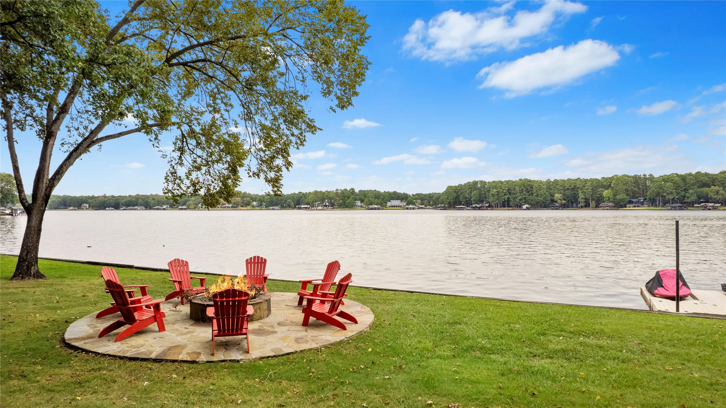 Panoramic Lake Cypress Springs Waterfront & Sunshine Views all year long! Set on a double lot of 1.61 beautiful acres, you'll love the wide water ambiance of over 200 ft. of waterfront. Luxury, comfort & lake living all come together....a rare find indeed!