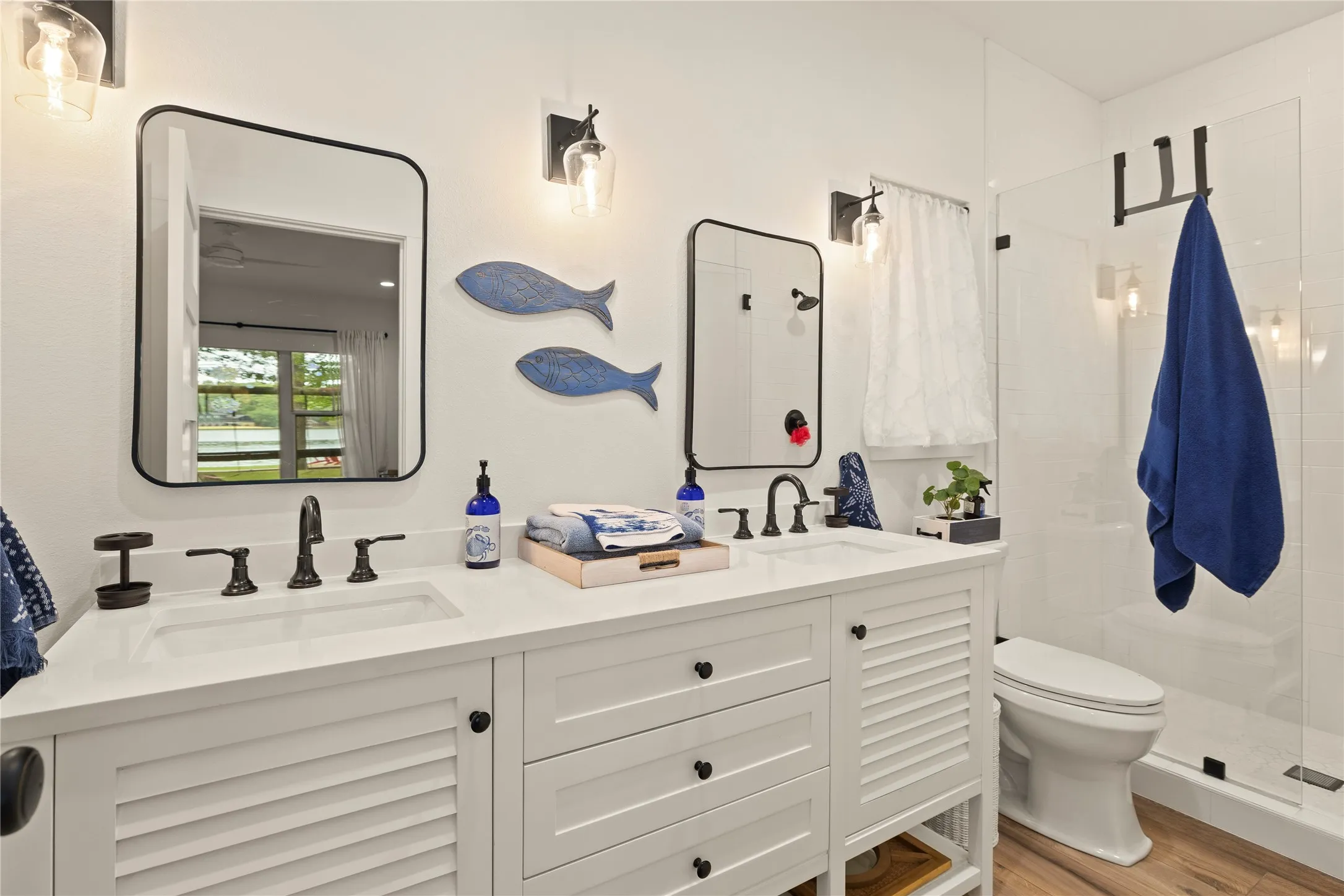 Super cute ensuite full bath #1 in the cottage. Both baths have walk-in showers.