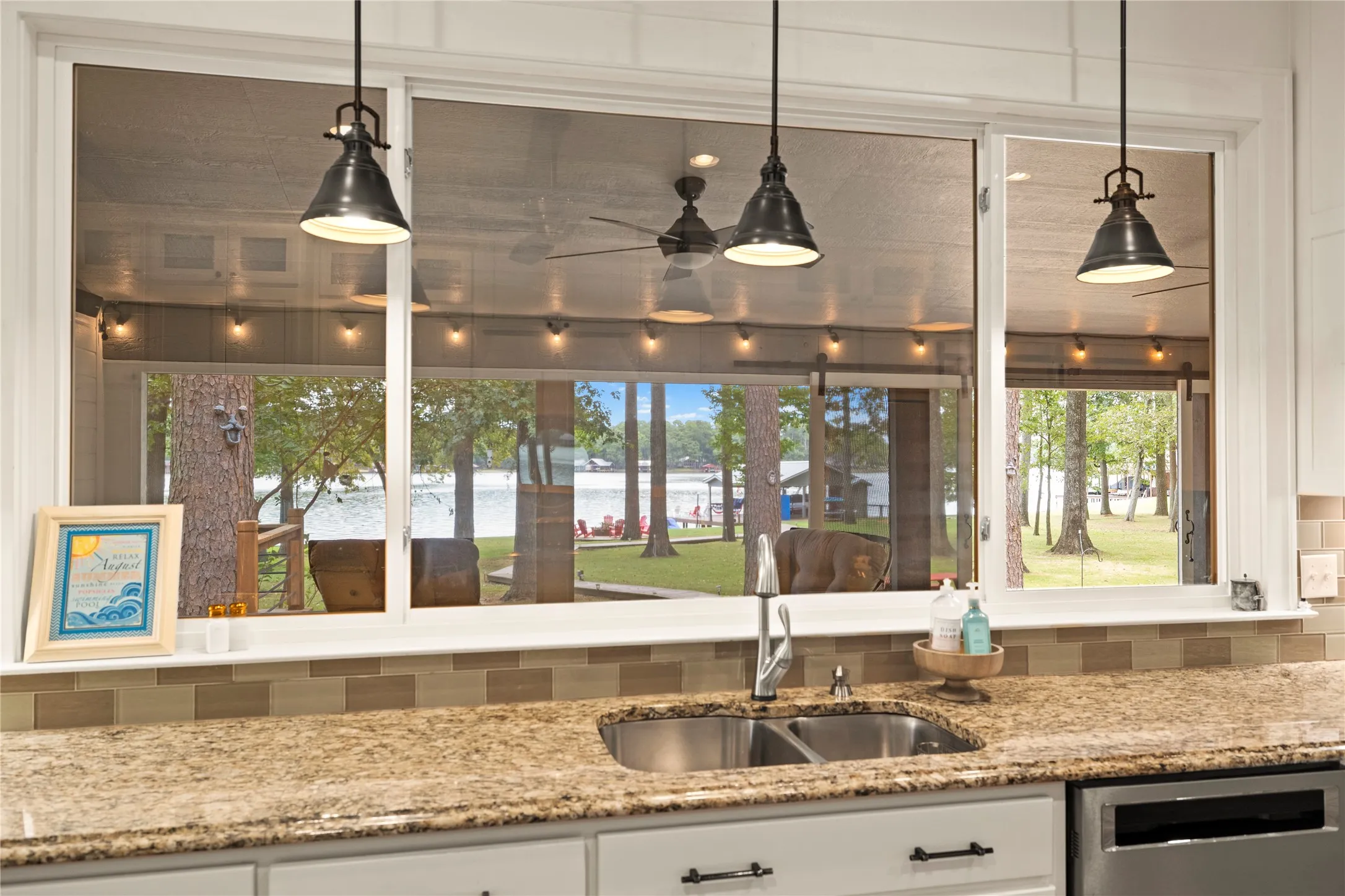 Dual windows facing the screened porch offer air flow + easy food service to those on the porch.