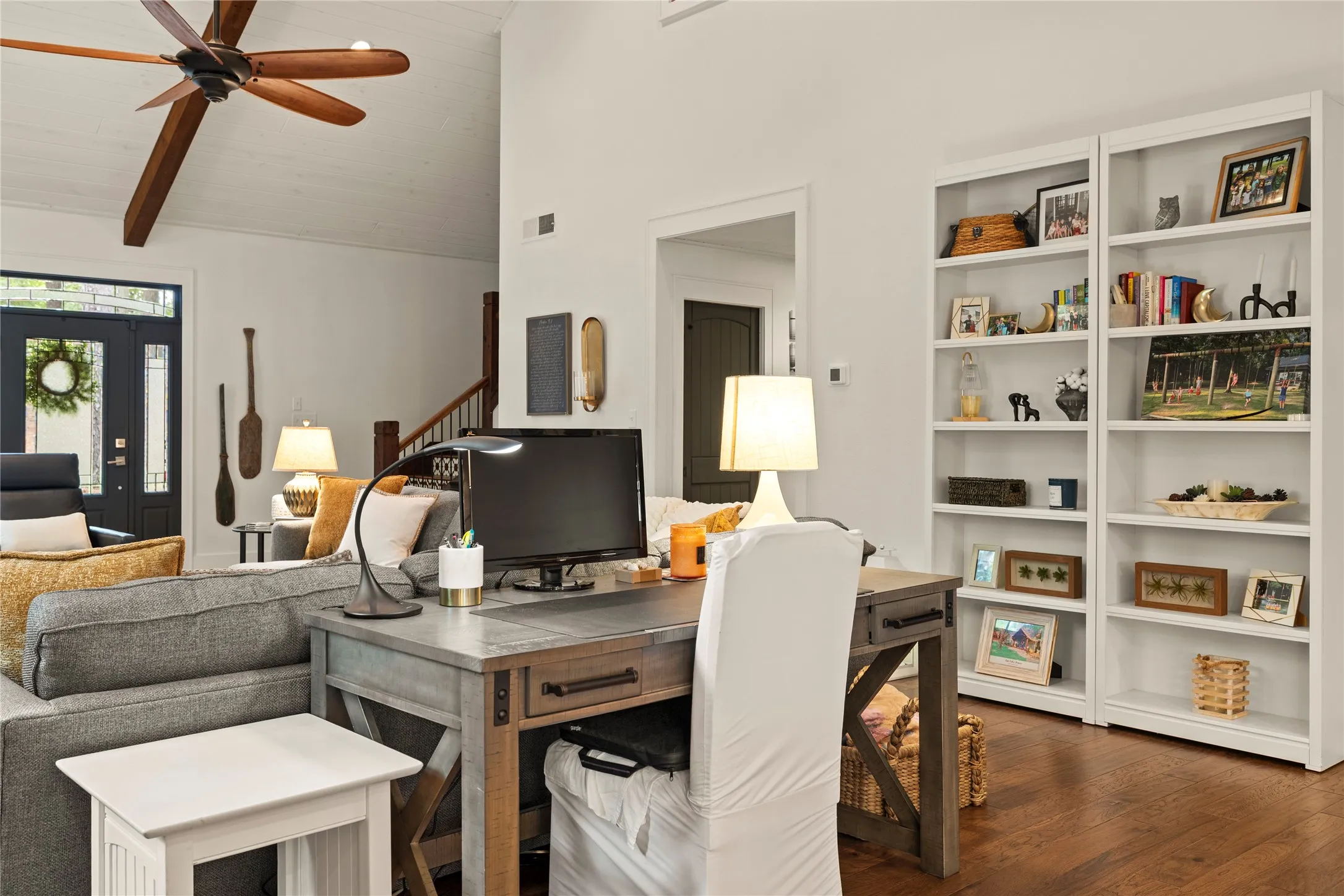 The sellers have incorporated a desk in the great room for those who need to conduct work from the lake. Built-in bookshelves to display your family favorites :)