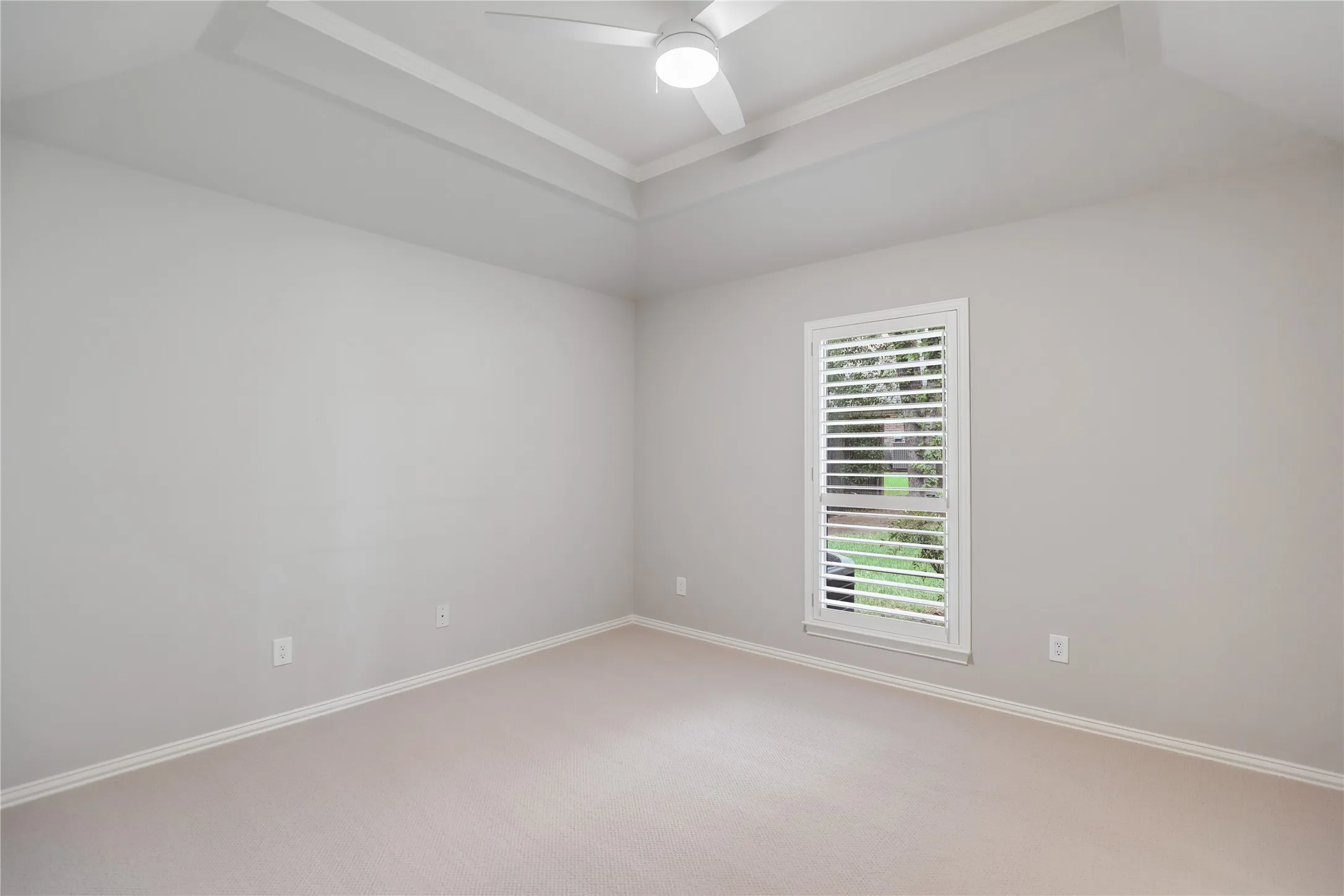 Bedroom with view of side yard