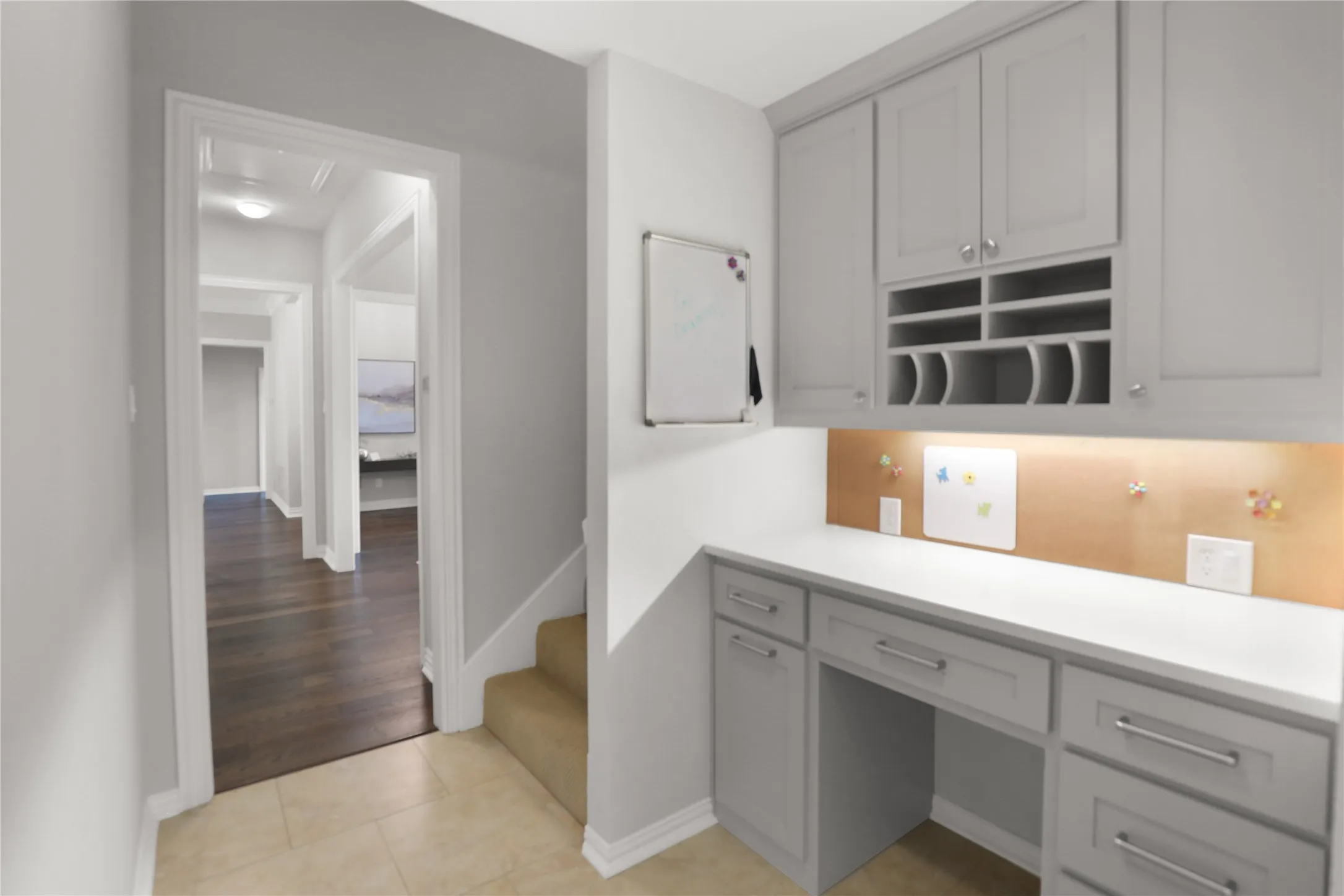 Drop Station featuring built-in cabinets and desk