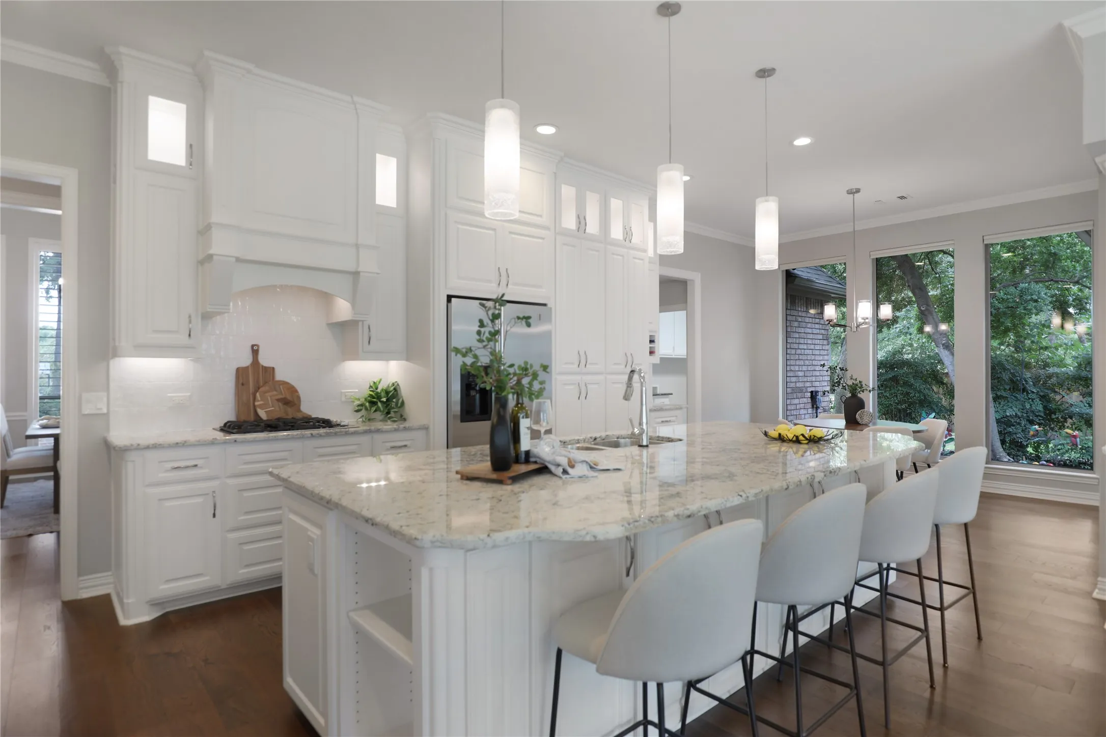 Recently remodeled kitchen with natural stone counters and breakfast counter