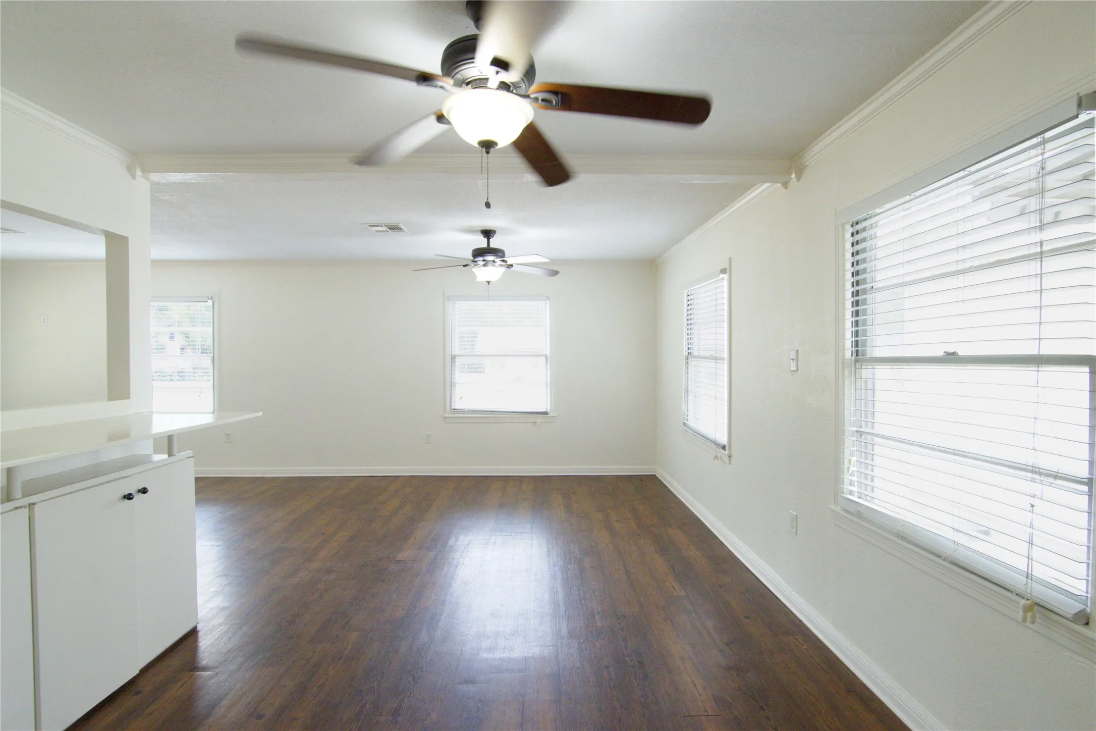 view again of dinning abd Bar open to living area.