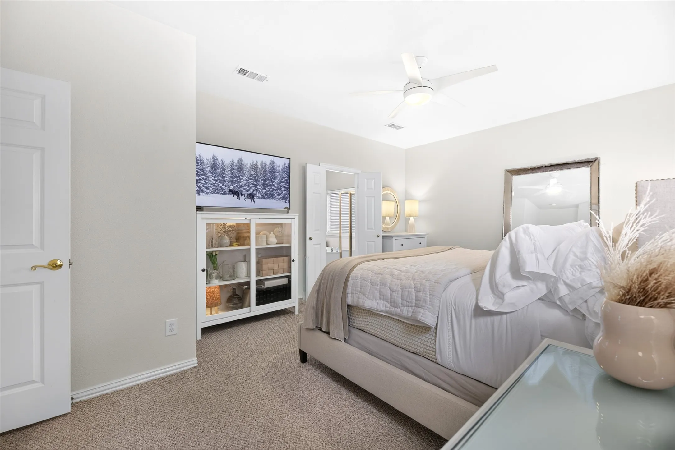 Textured carpeting and neutral wall tones