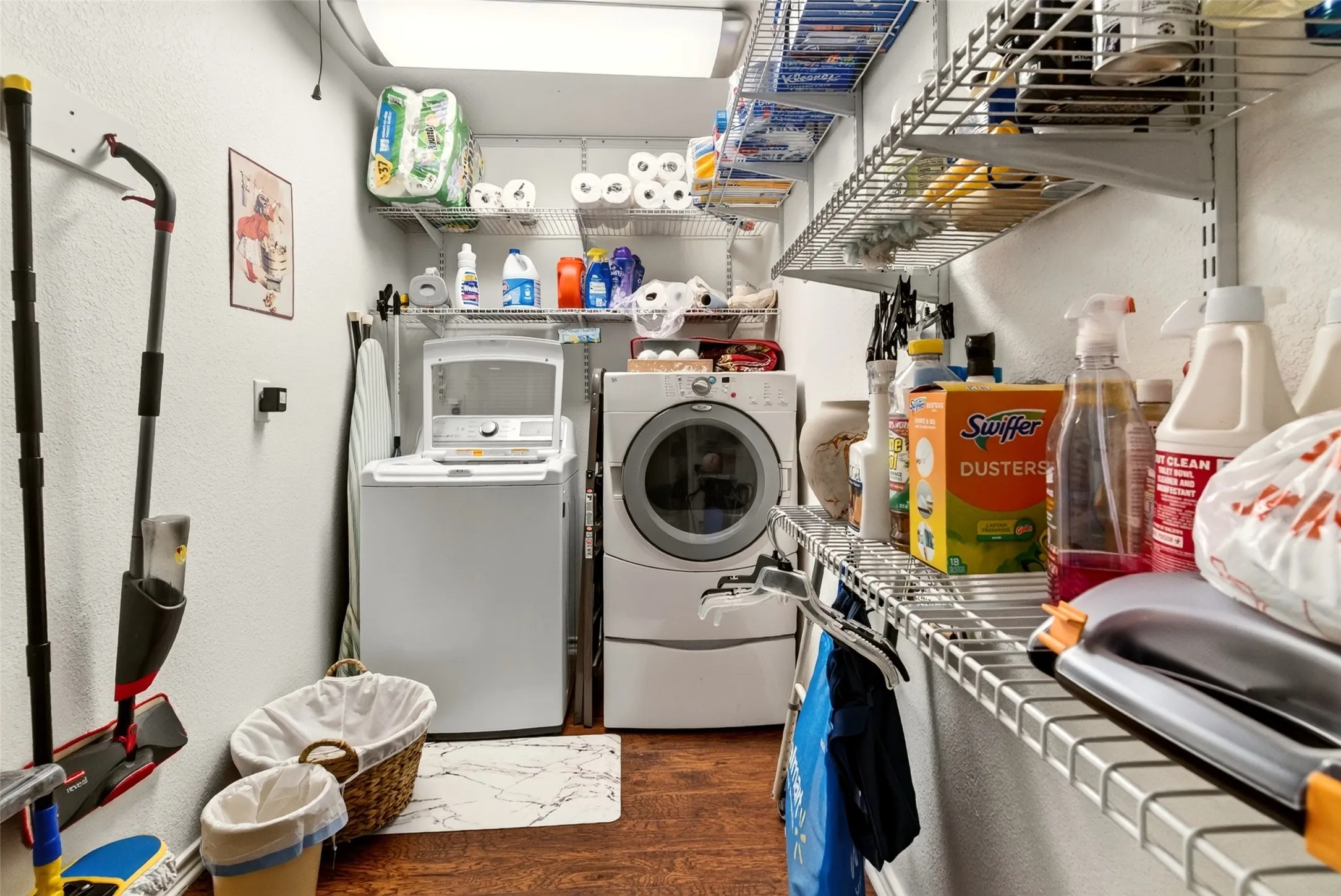 Large walkin laundry room with additional storage