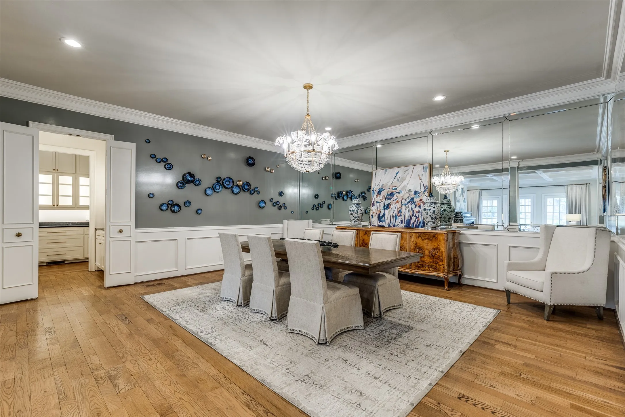 Oversized dining area with timeless chandelier with room for large gatherings