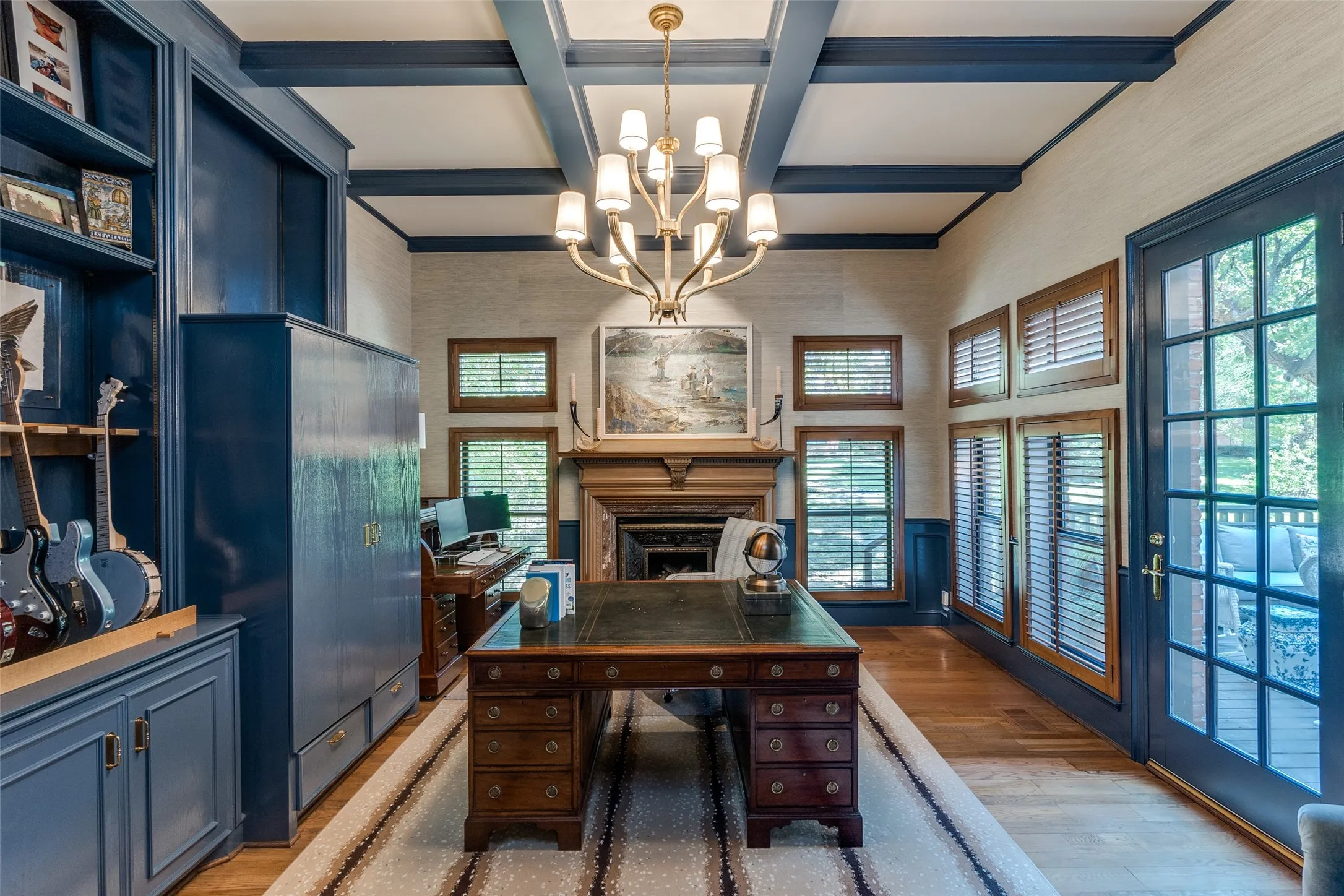 Additional views of formal study anchored with a statement making fireplace and creekside and deck views.