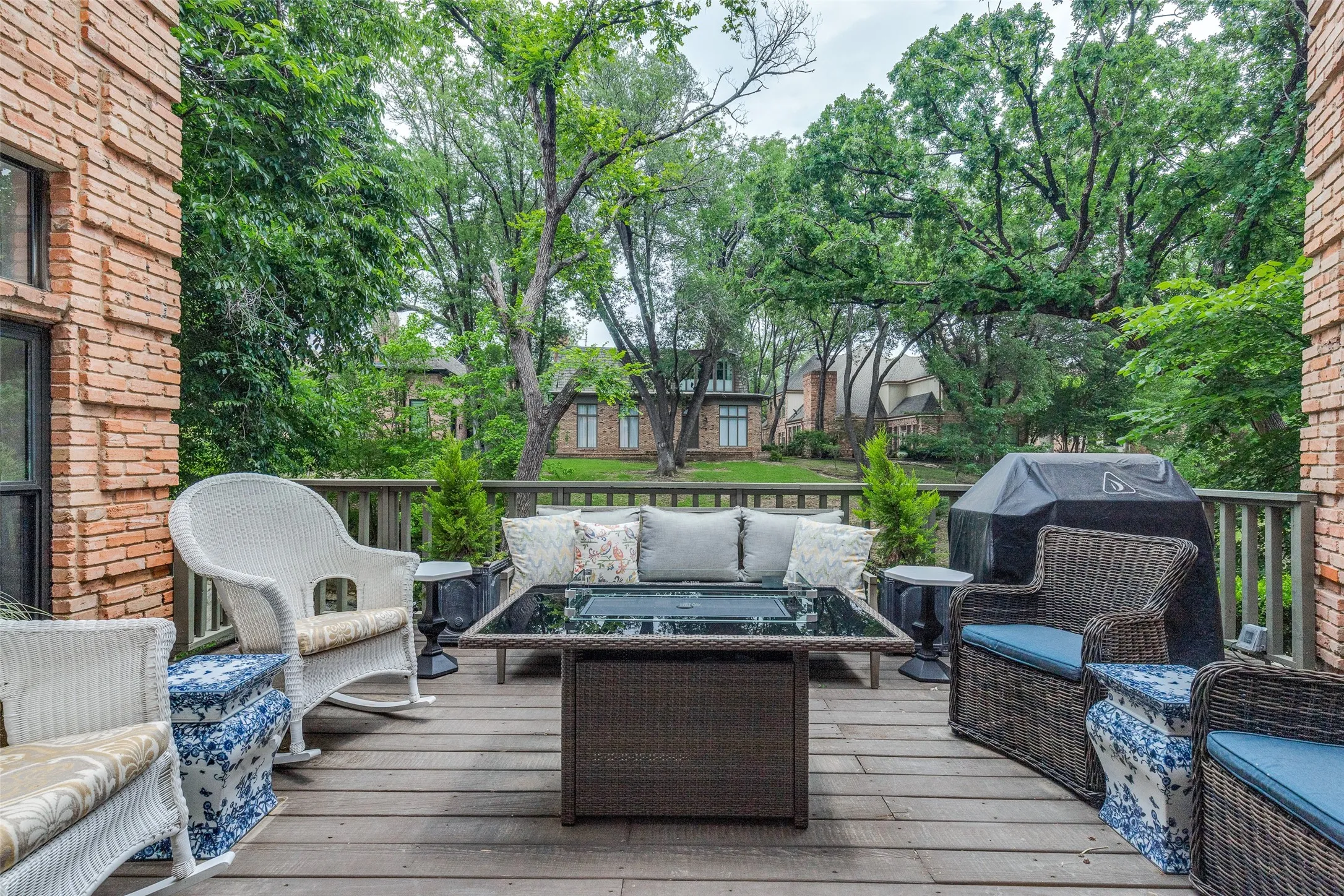 Tree-lined creekside deck just steps off the living room, study and breakfast room that offers a quiet, natured framed spot to relax or entertain.
