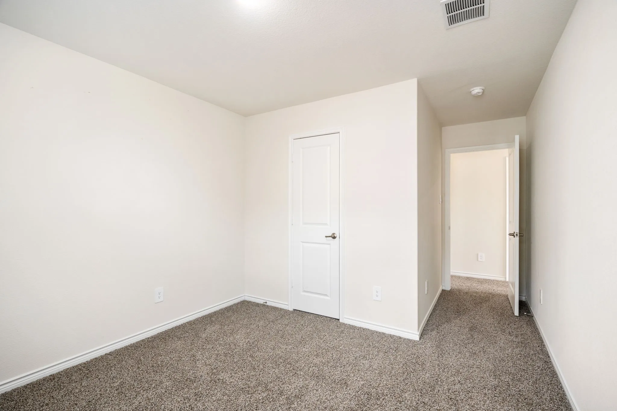 Plush carpeting and crisp white walls