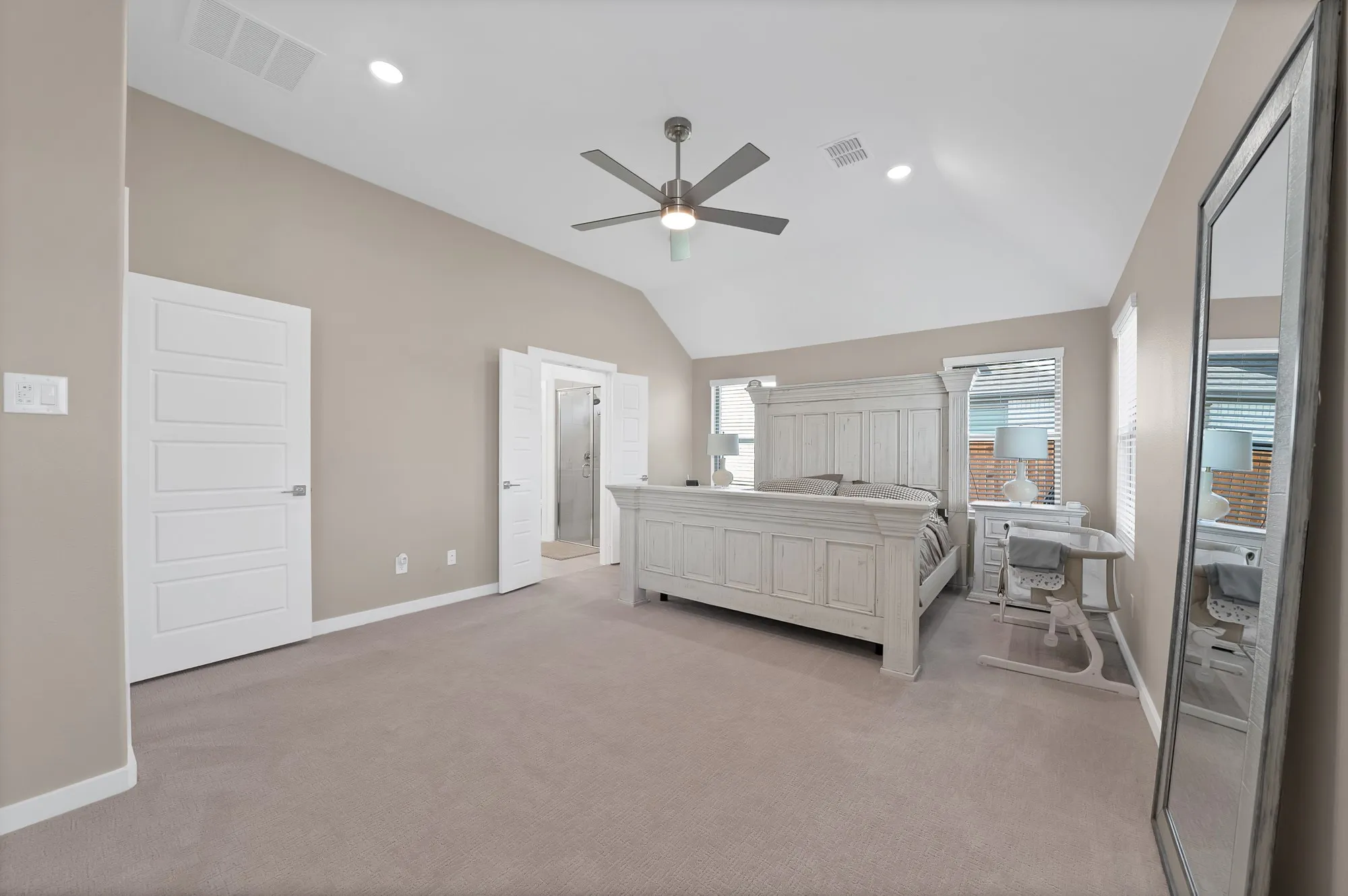 Another view of the primary bedroom.