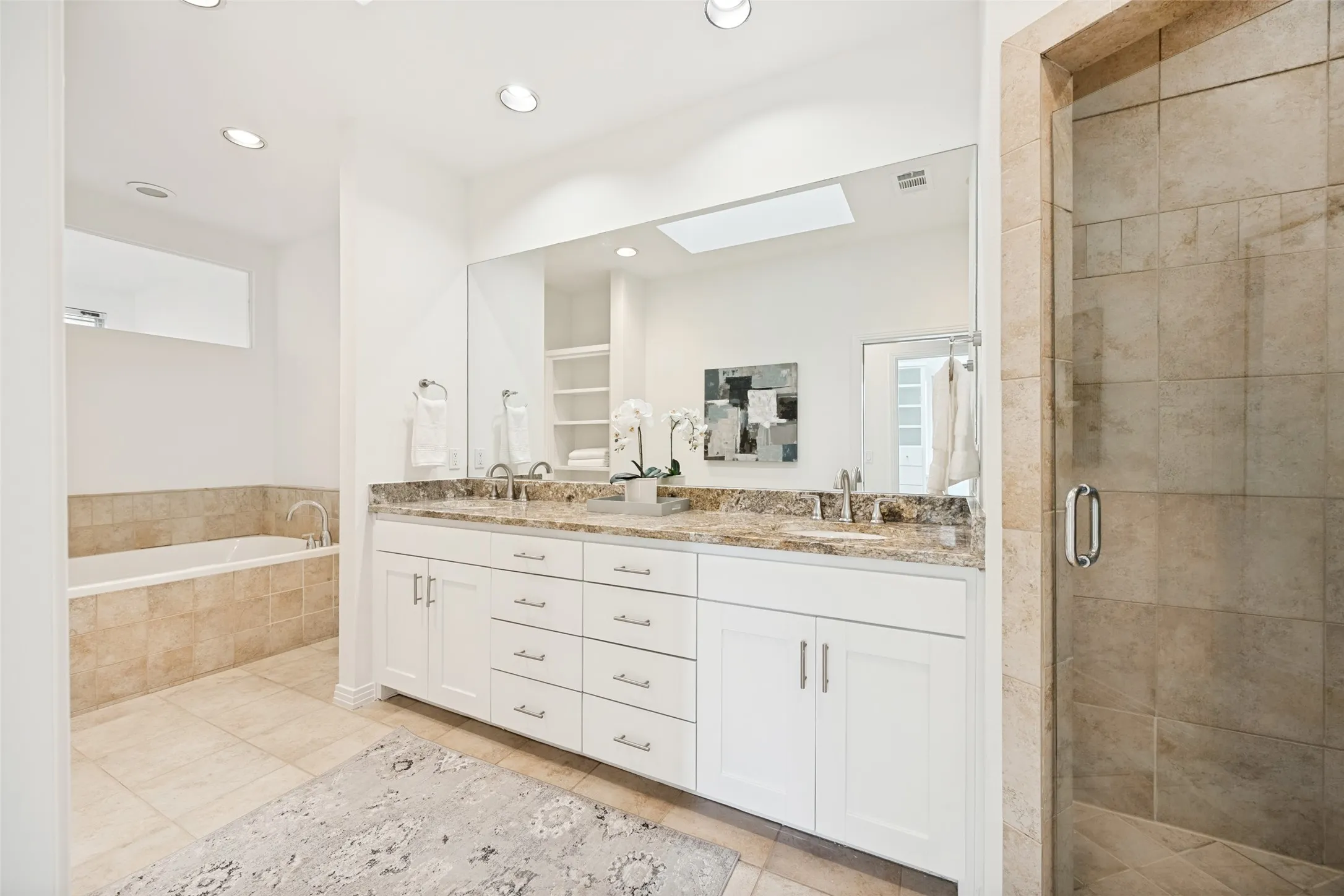 Dual sinks, separate shower and bathtub
