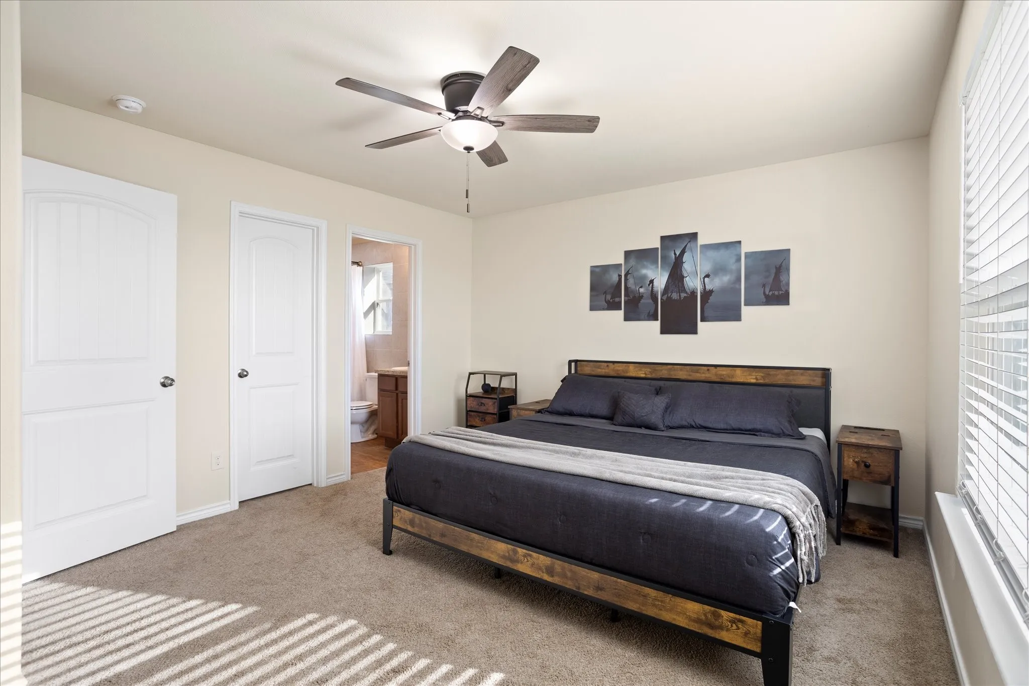 Recessed lighting, ceiling fan, neutral wall color, carpeted flooring, and a window with blinds