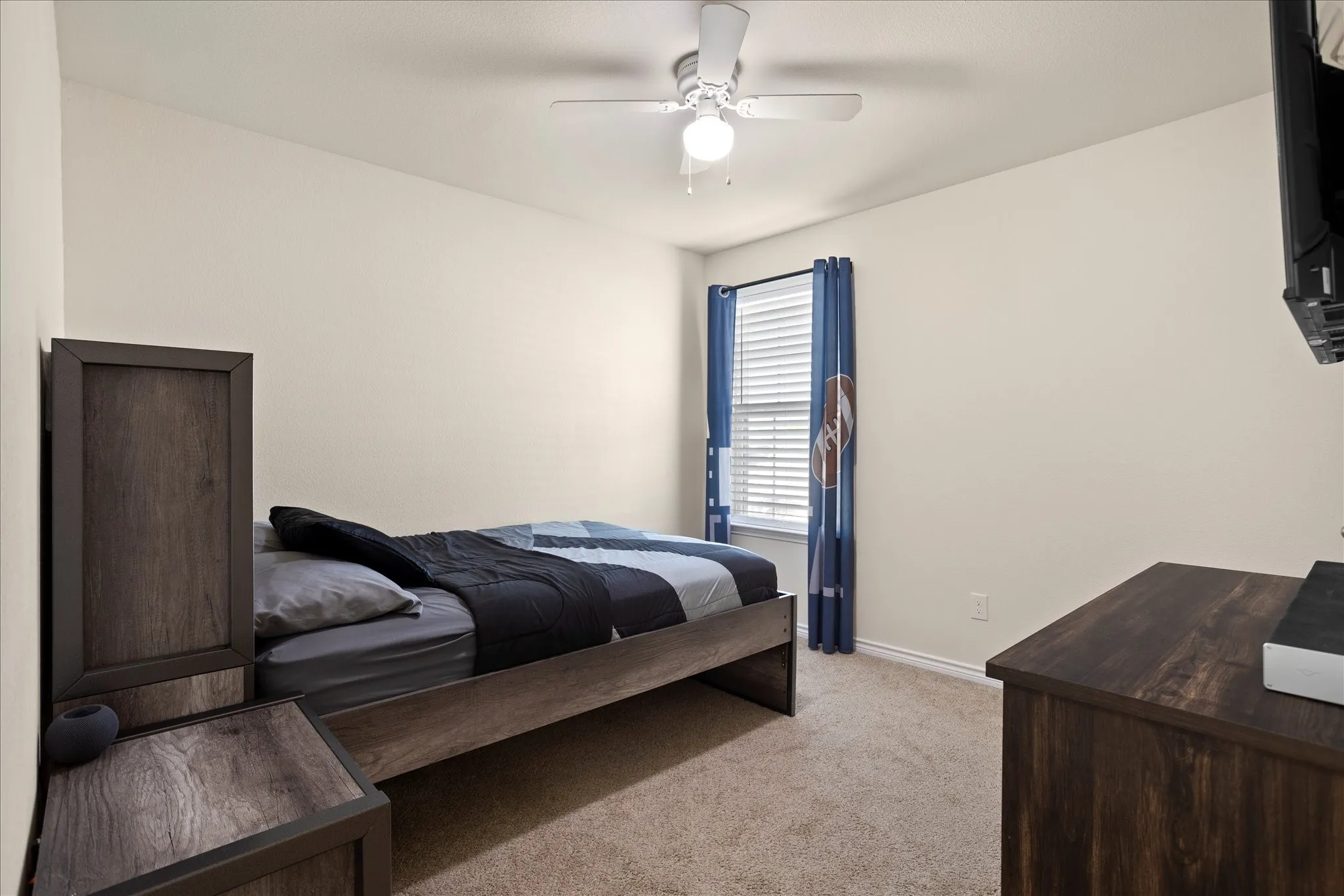 Wall-to-wall carpeting and white walls
