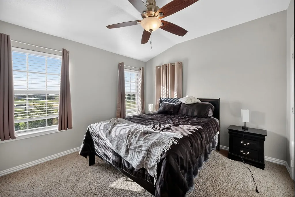 Vaulted ceiling with an attached ceiling fan