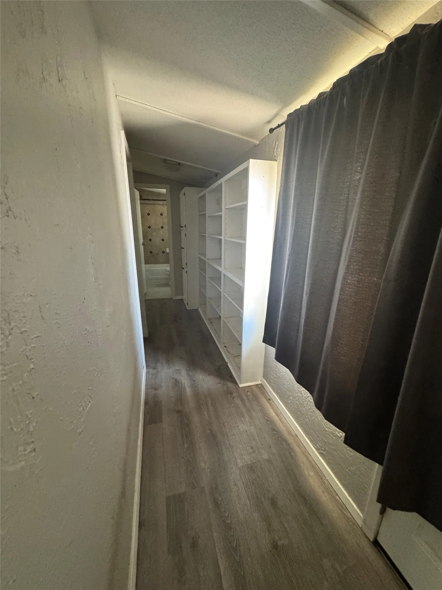 Wood-finish flooring with built-in shelving