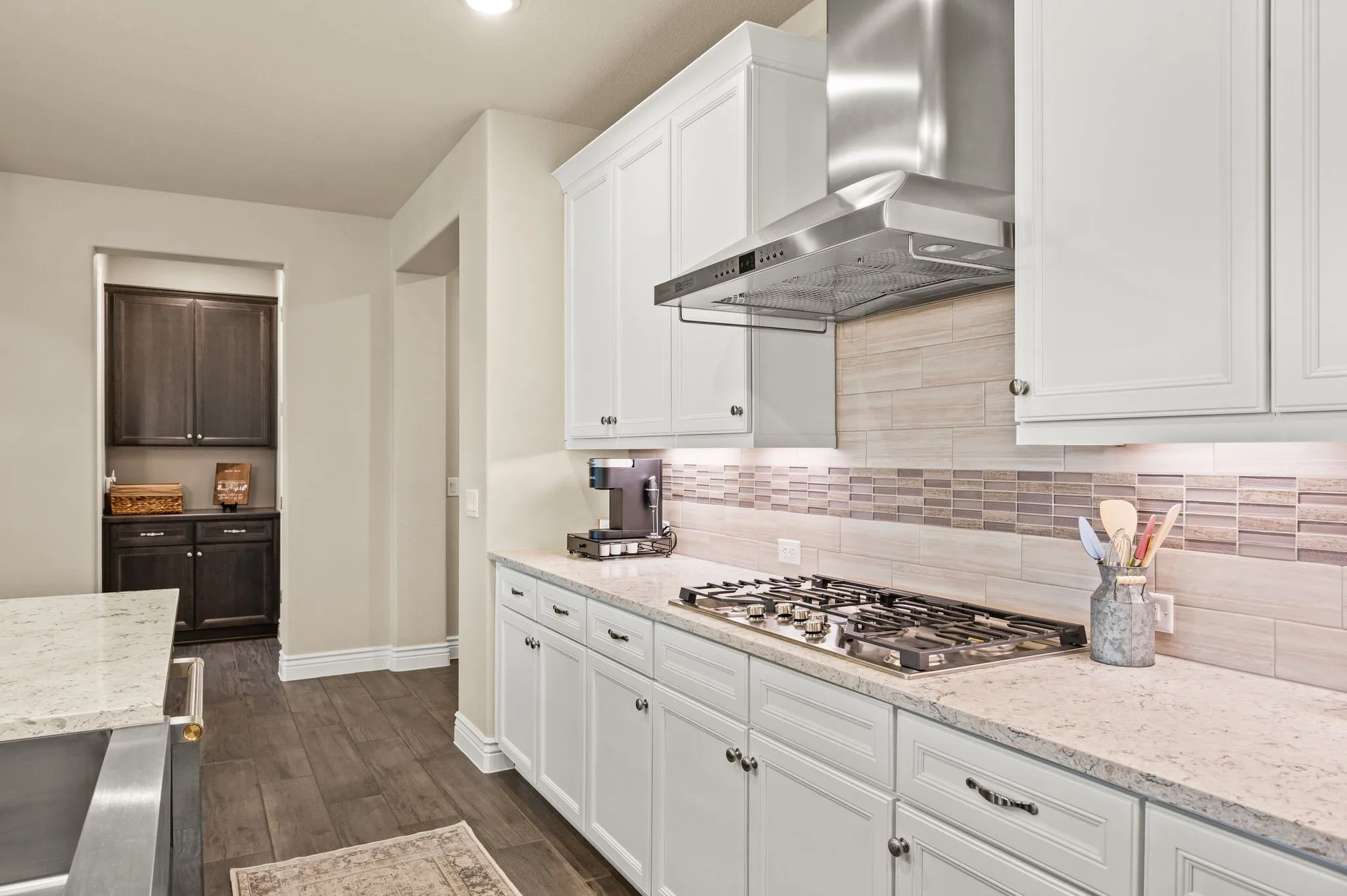 Stainless Monogram appliances with gas cook top