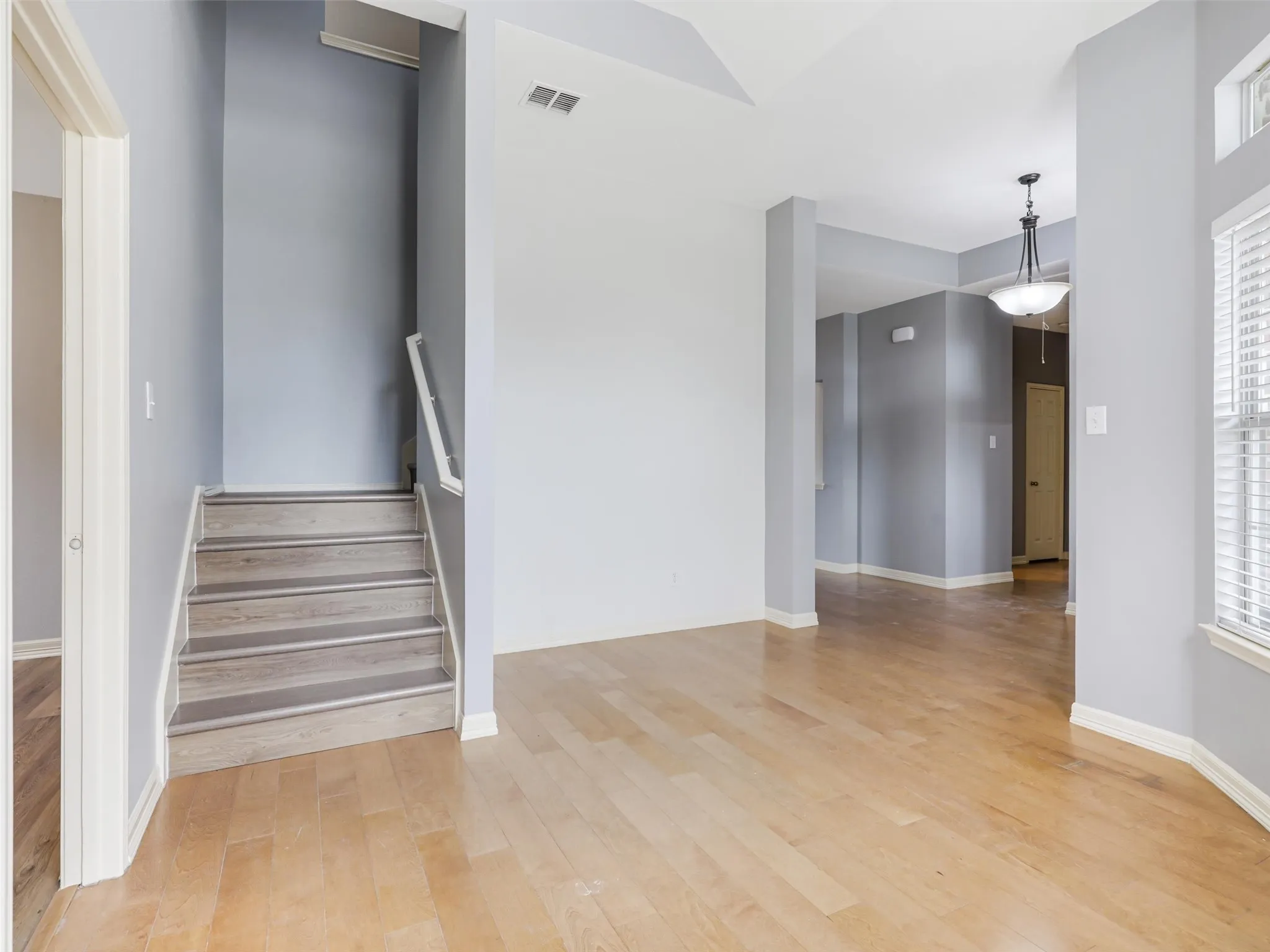Hardwood-style flooring throughout the main level