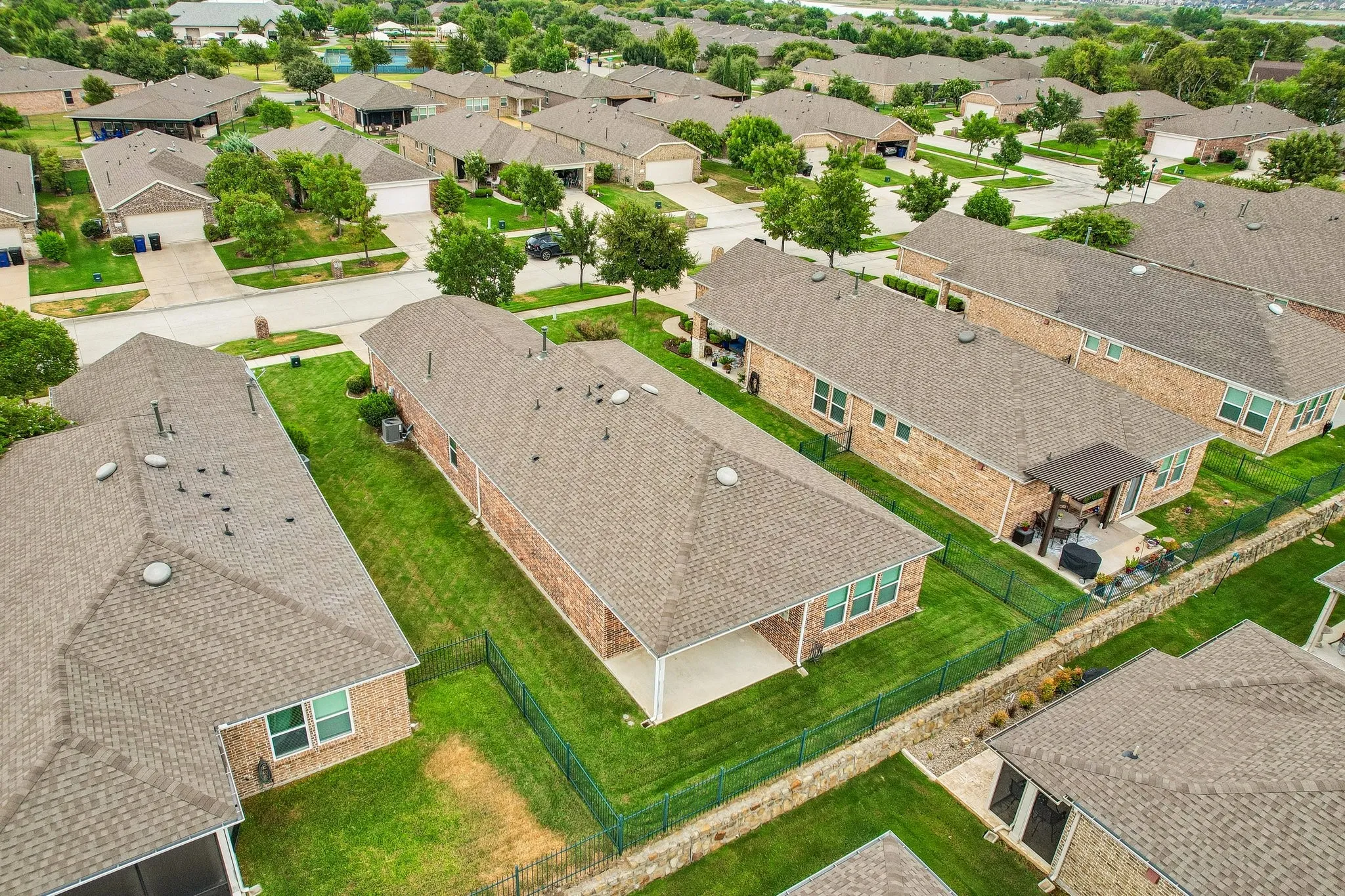 Brick exterior with covered patio