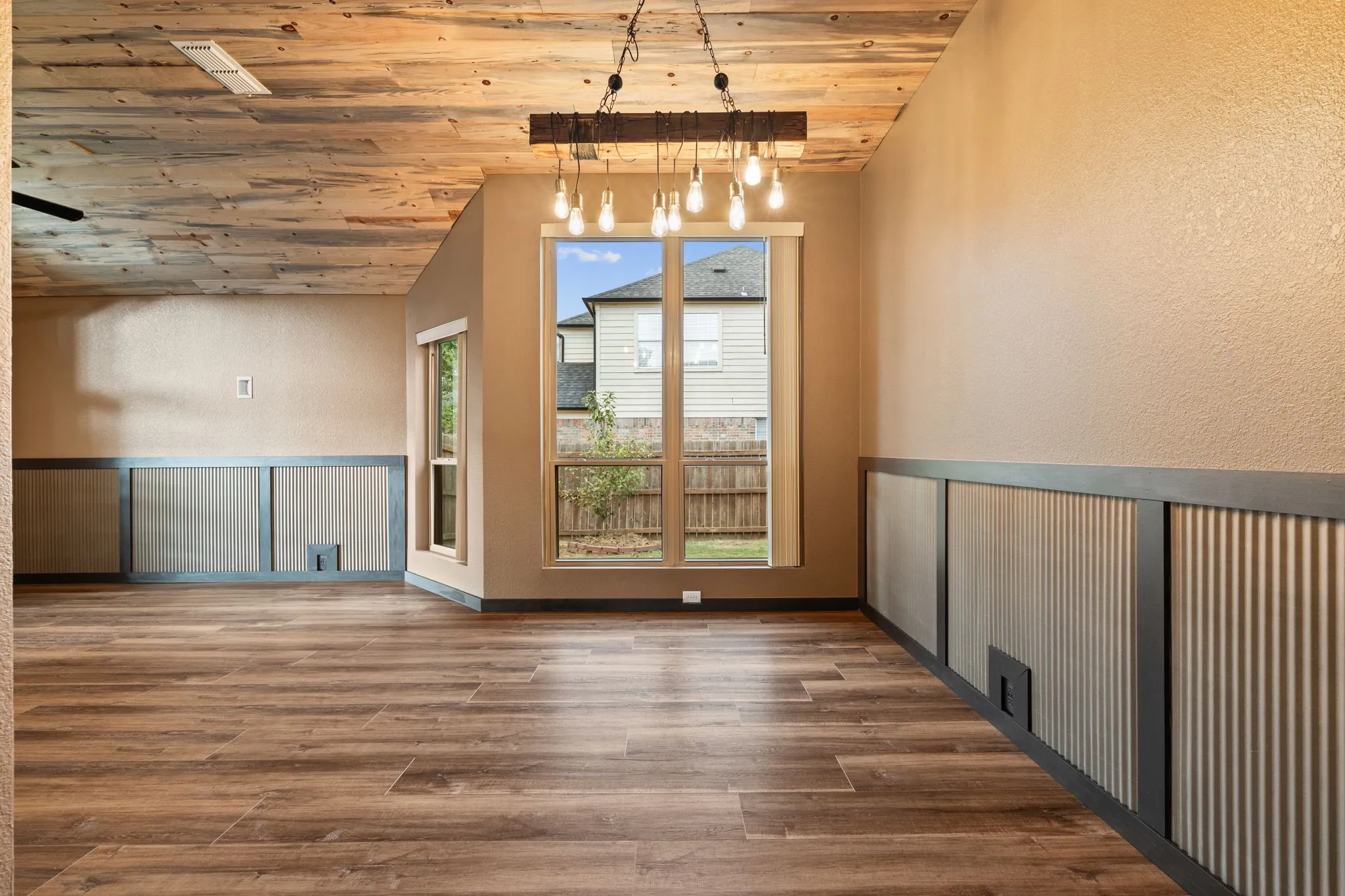 Wood-finish plank flooring throughout