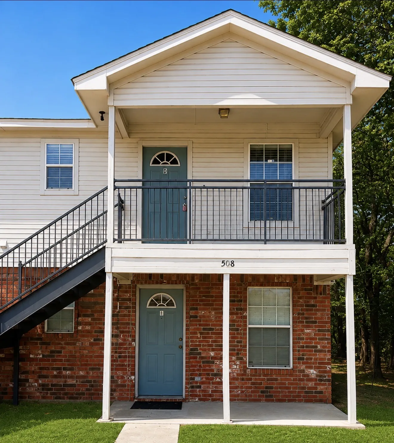Two-story exterior with brick and siding facade