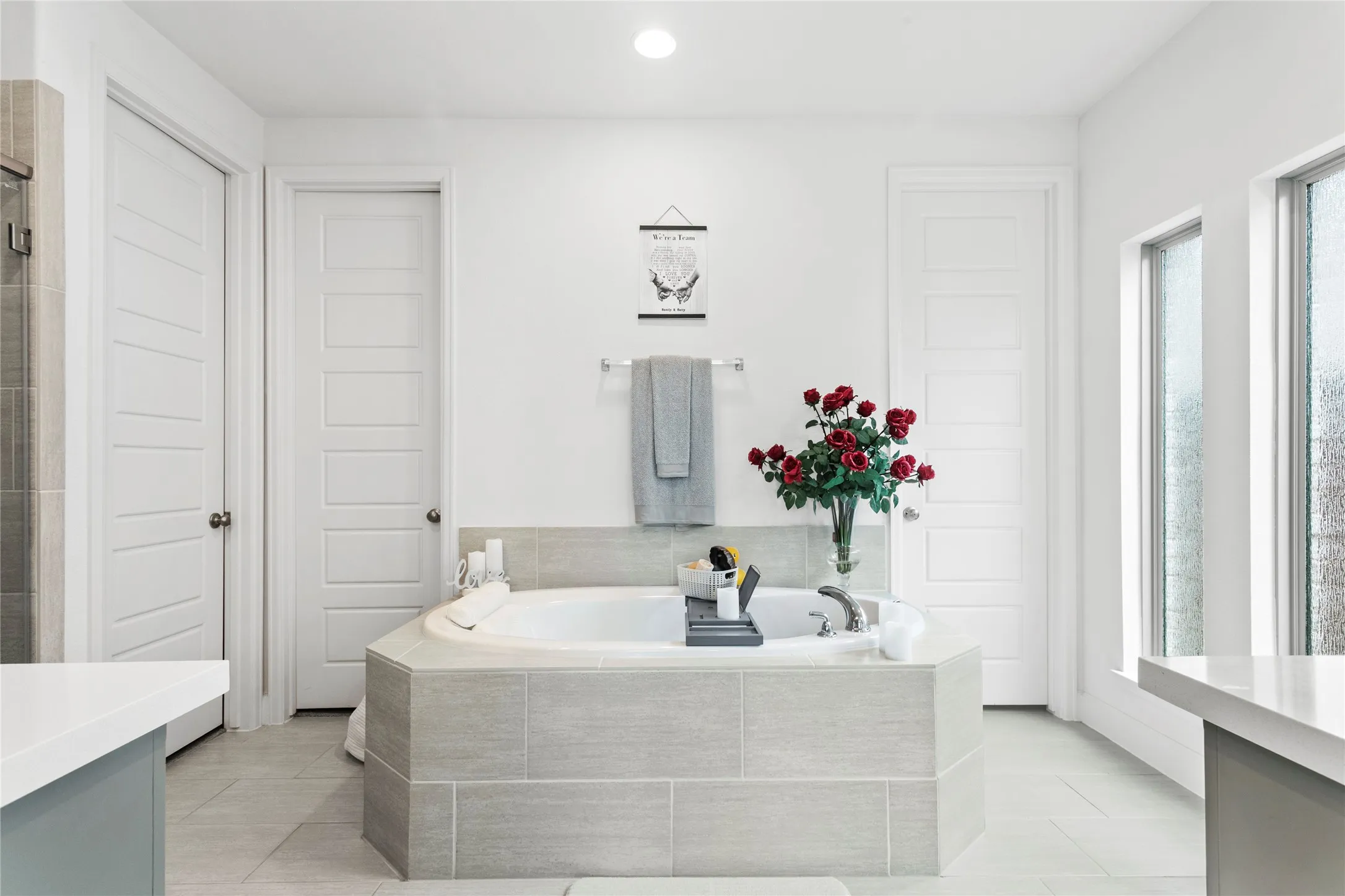 His and her vanities and large garden tub