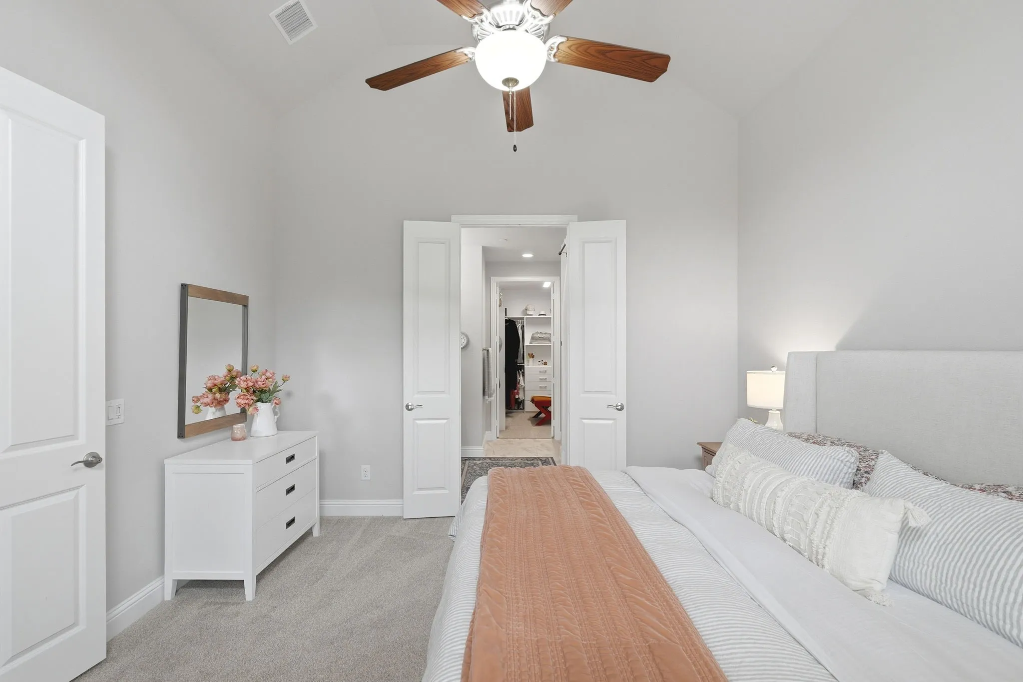 Vaulted ceiling with a wood-blade ceiling fan