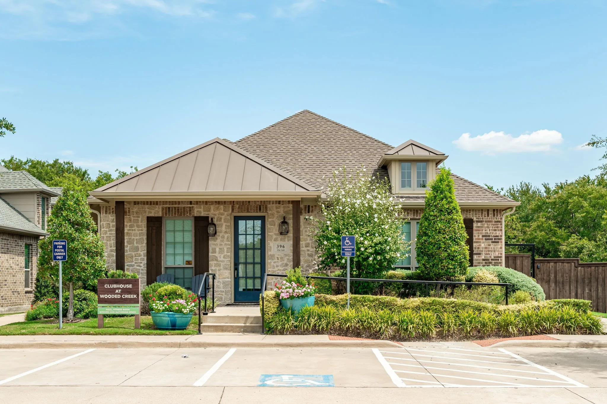 Community Center including mailboxes, workout senter, living and kitchen spaces, patios, grills,and pool!