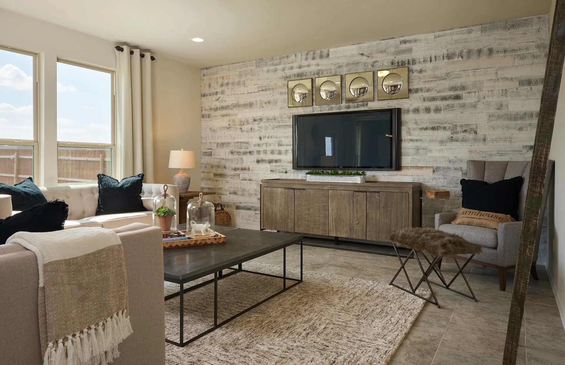 *Model Representation - Spacious gathering room with large windows