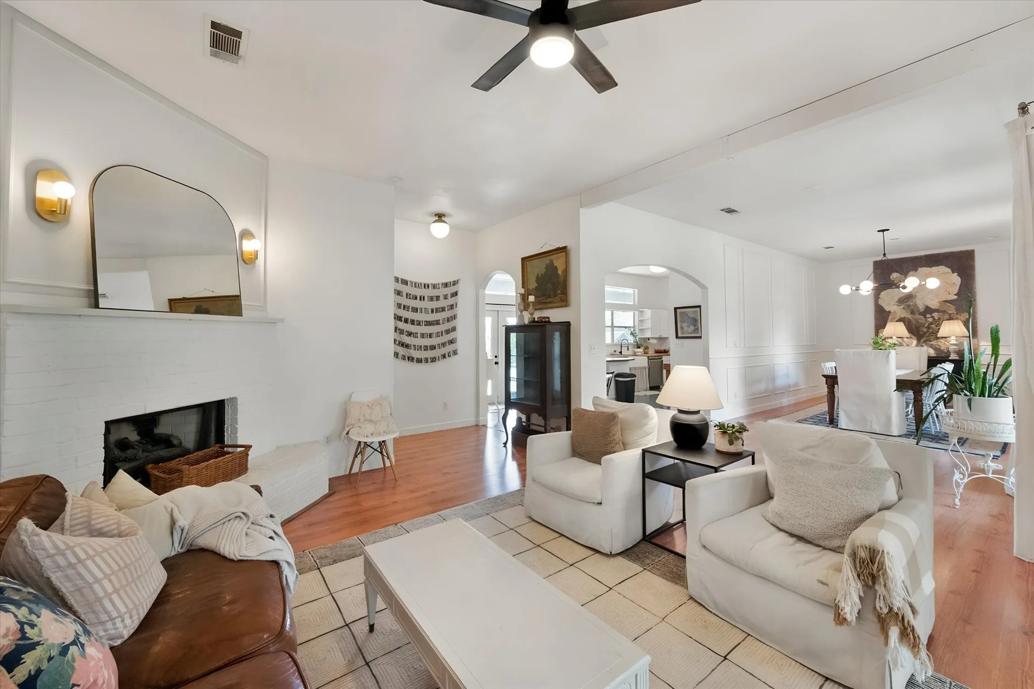 Cozy fireplace anchors the living room.