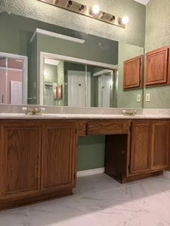 Owner's suite garden bath, dual sinks and multiple closets