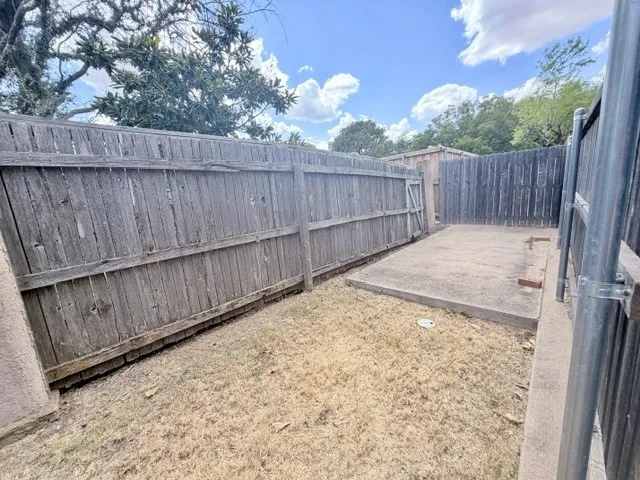 DOG RUN AREA WITH CONCRETE PAD