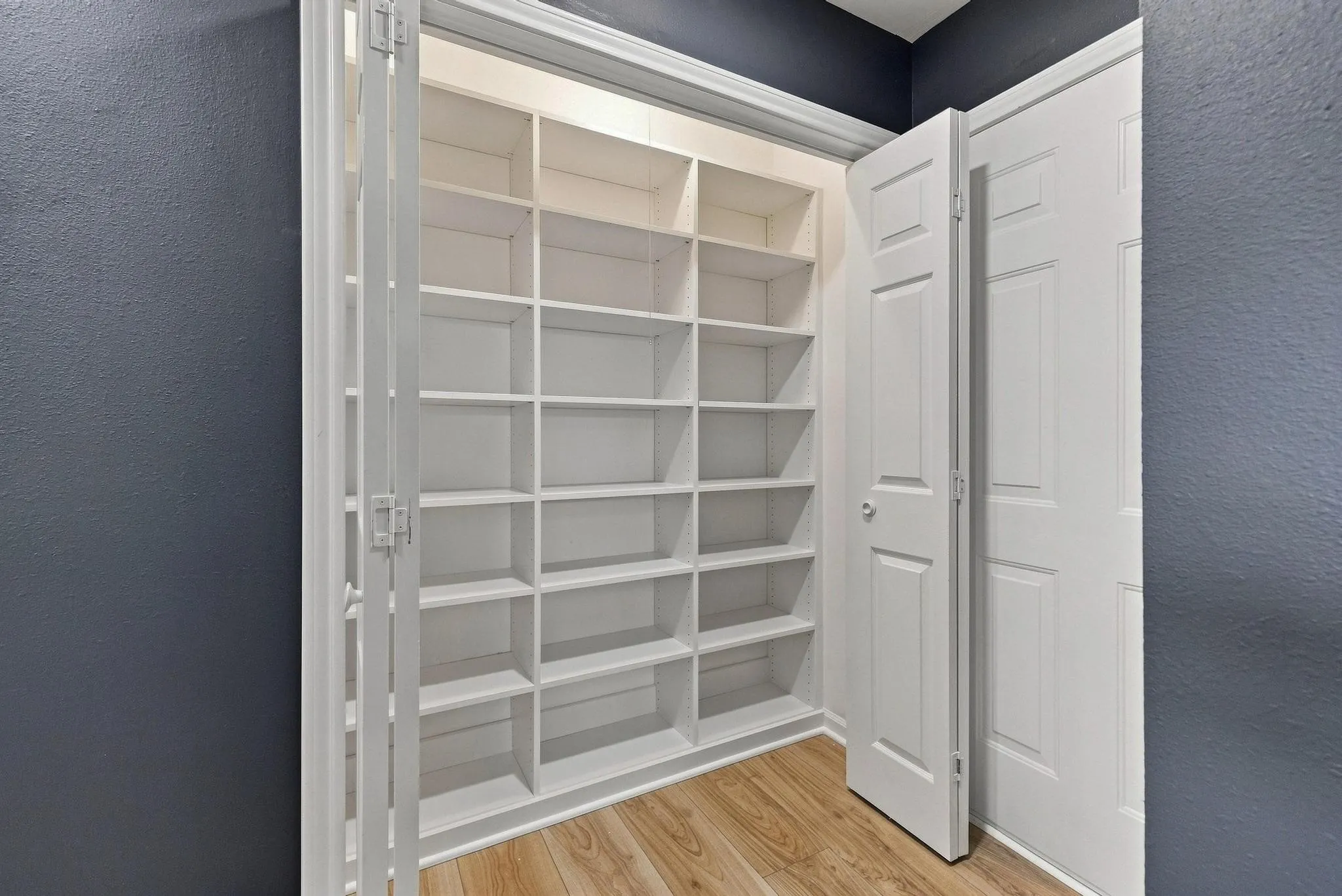 Custom pantry system that is adjustable and brand new. custom pantry system