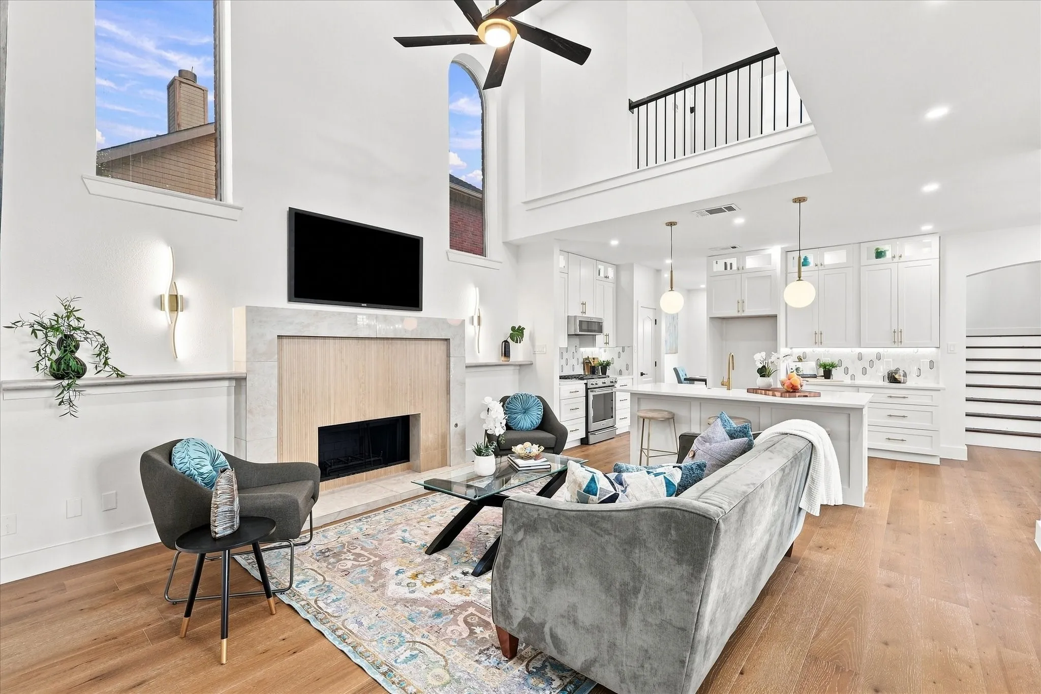 Living room is open to the kitchen and the 2nd floor bedrooms.