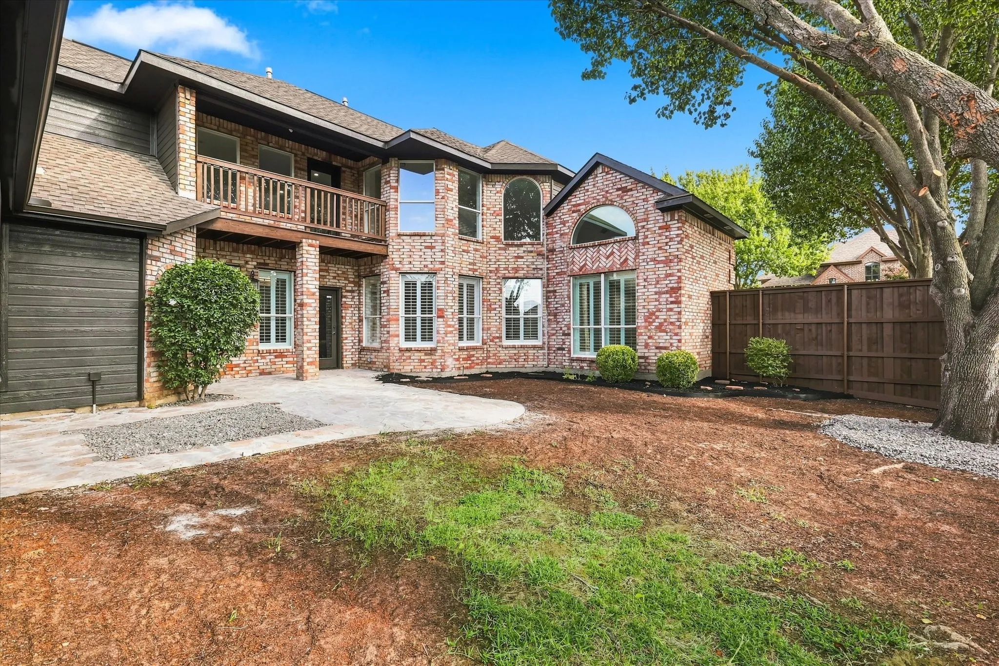 Eight foot fence offers privacy, C shape floor plan brings in lots of light. Mature trees to make this your home.