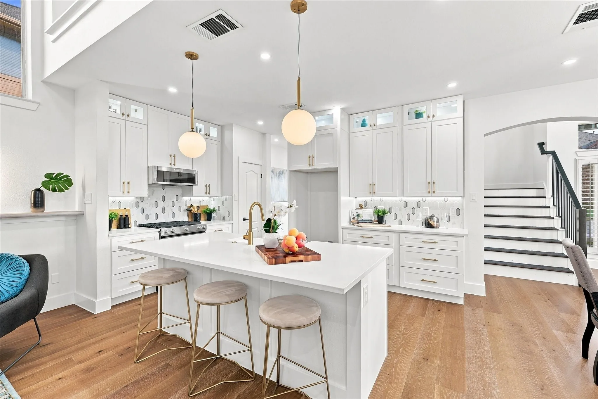 The Kitchen has been completely re done with all new soft close cabinets, quartz island, gas range, pendant lights, and much more