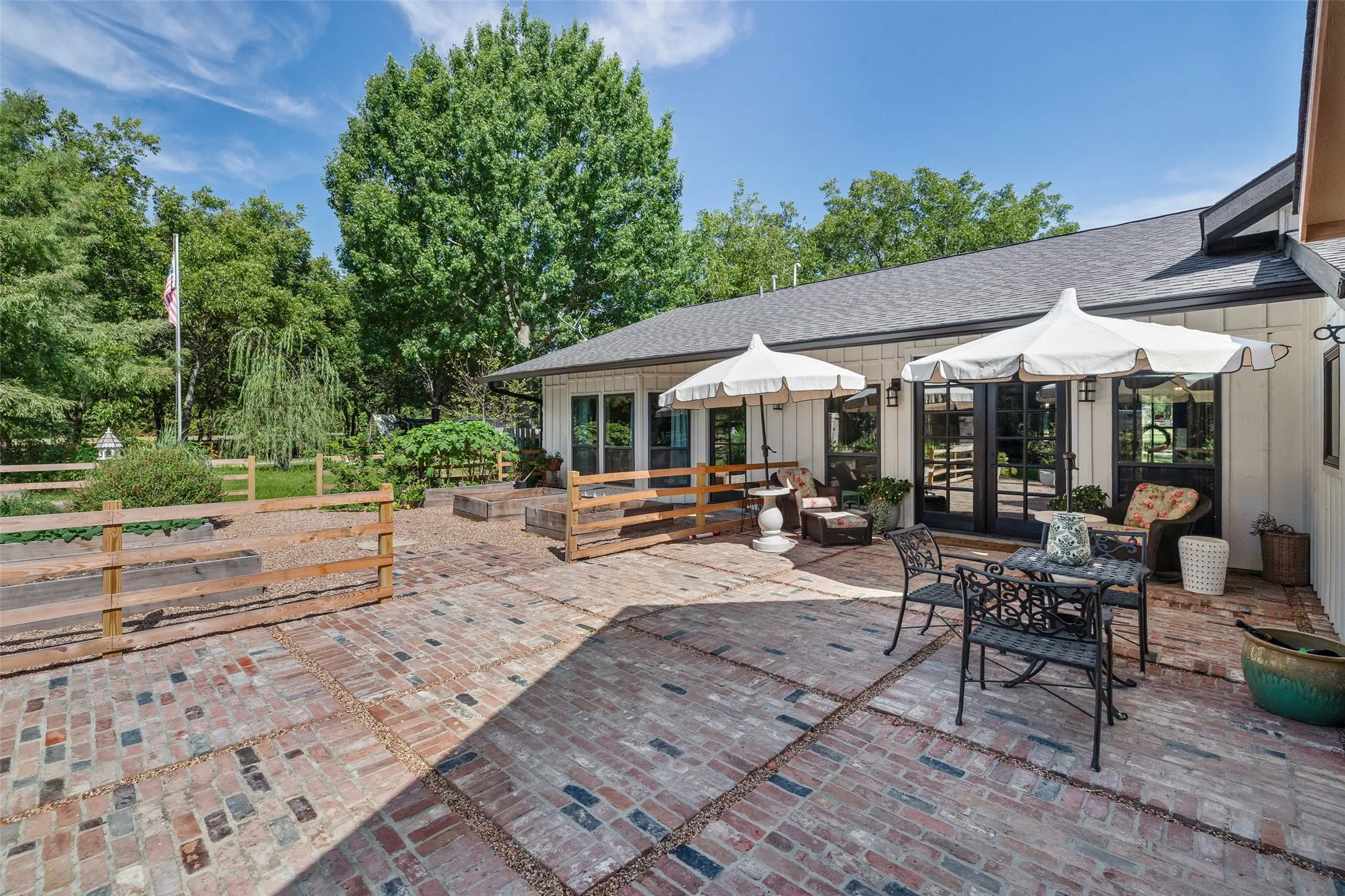 Part of the patio has raised gardens, perfect for that green thumb in the family!