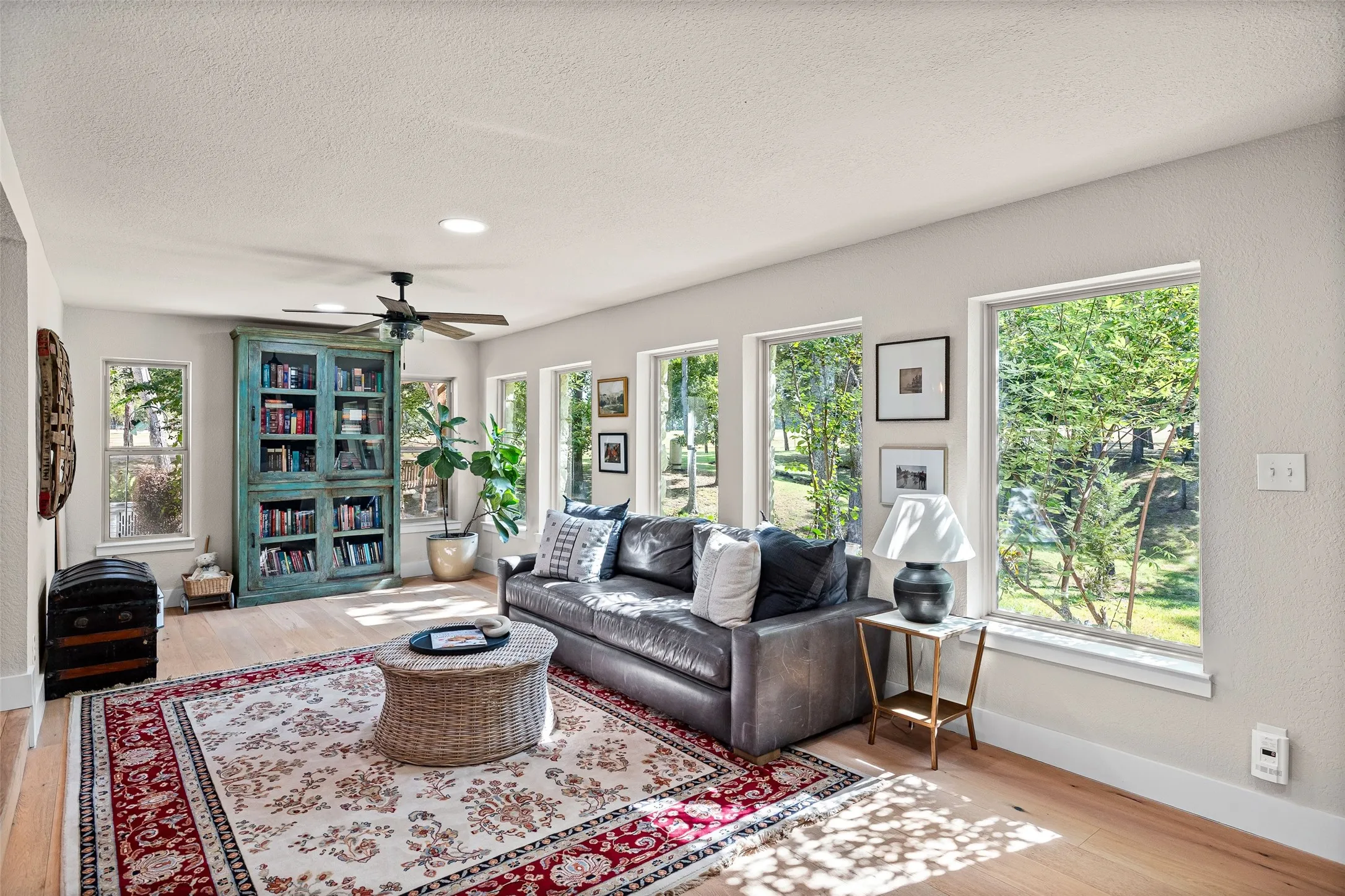 Just on the other side of the sitting room, is this spacious living space.