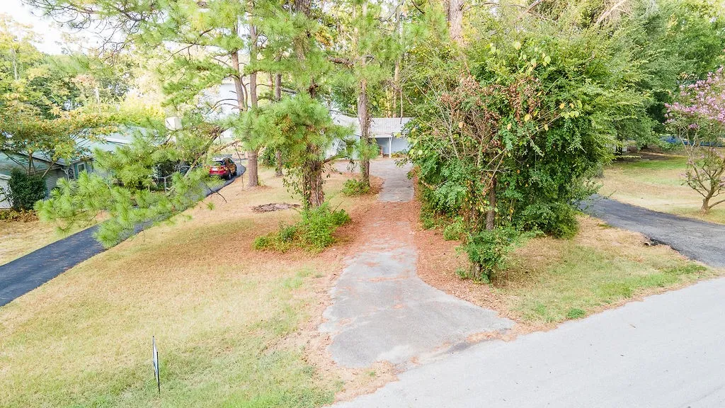 Single Family Residence For Sale in Wood County , 586 County Road 2298, Mineola, Texas 75773, 2 Bedroom, 2 Bathroom, Garage spaces, 1,250 Sqft, built in 1970, mls#21372085, Real Estate Agent in Mineola, Homes For Sale in Wood county, Homes For Sale in Mineola, Realtor in Mineola Texas, Real Estate Brokerage Independent Realty Texas, Luminita Cordes Realtor
