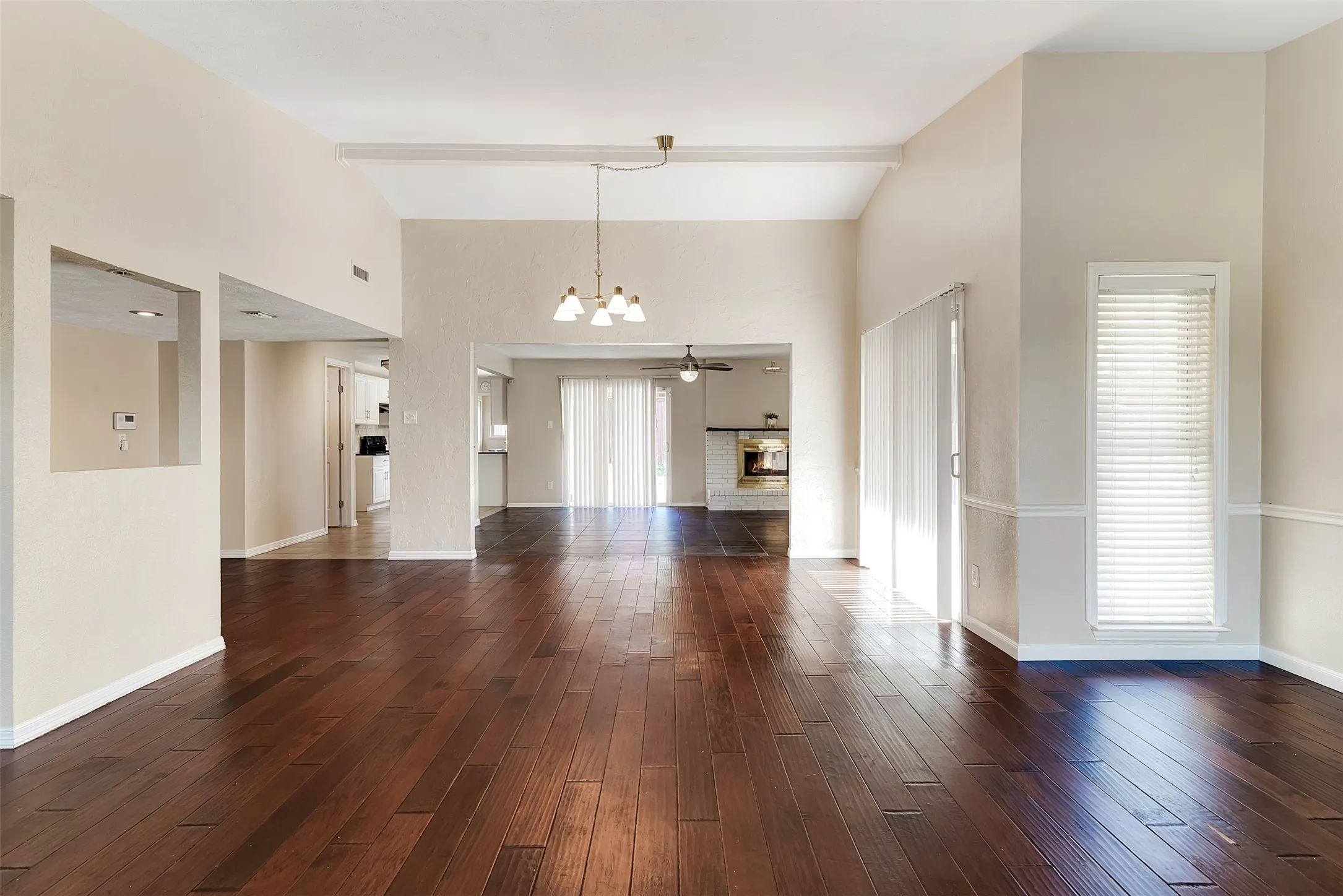 Living Room and Dining Area With Wood Floors