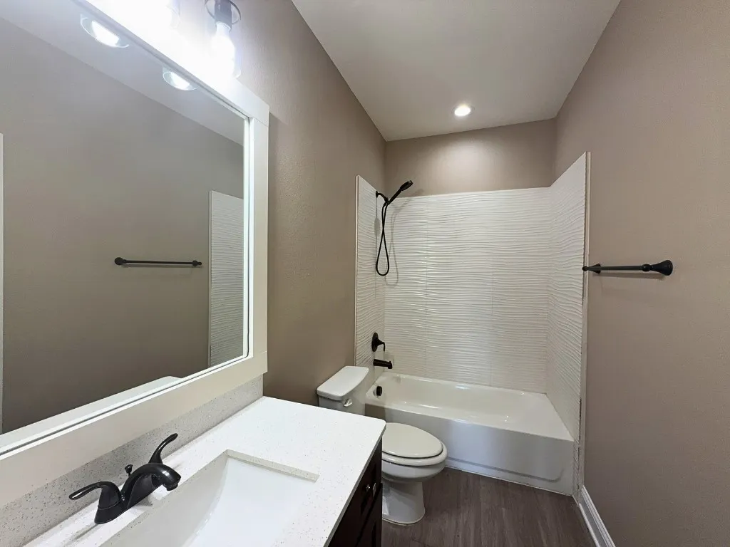 Full bath with tub-shower combo