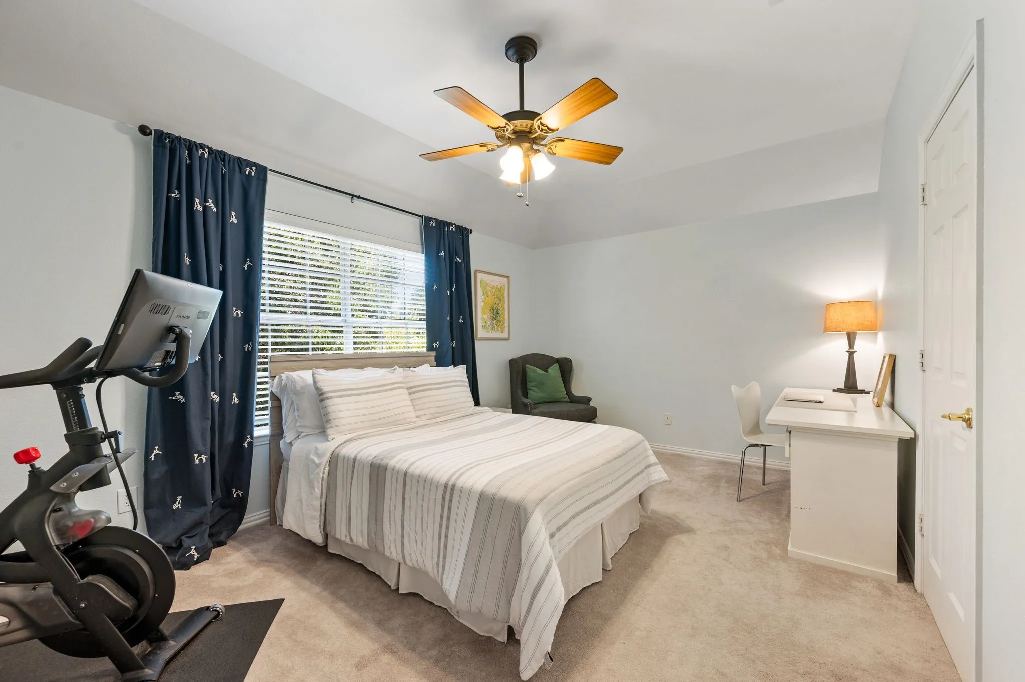 Generously sized secondary bedroom provides room for sleeping, studying, exercising or creating a personalized retreat.
