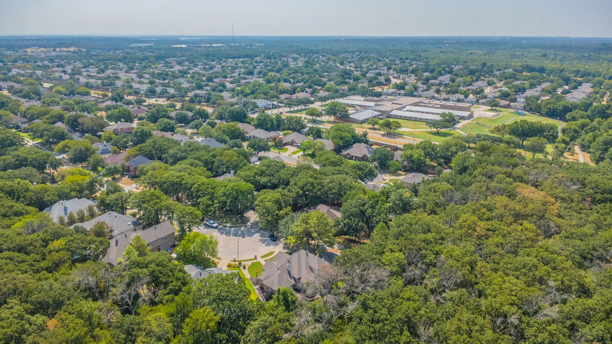Just a few blocks from McNair Elementary to the south, and Teasley Lane (FM 2181) to the east.