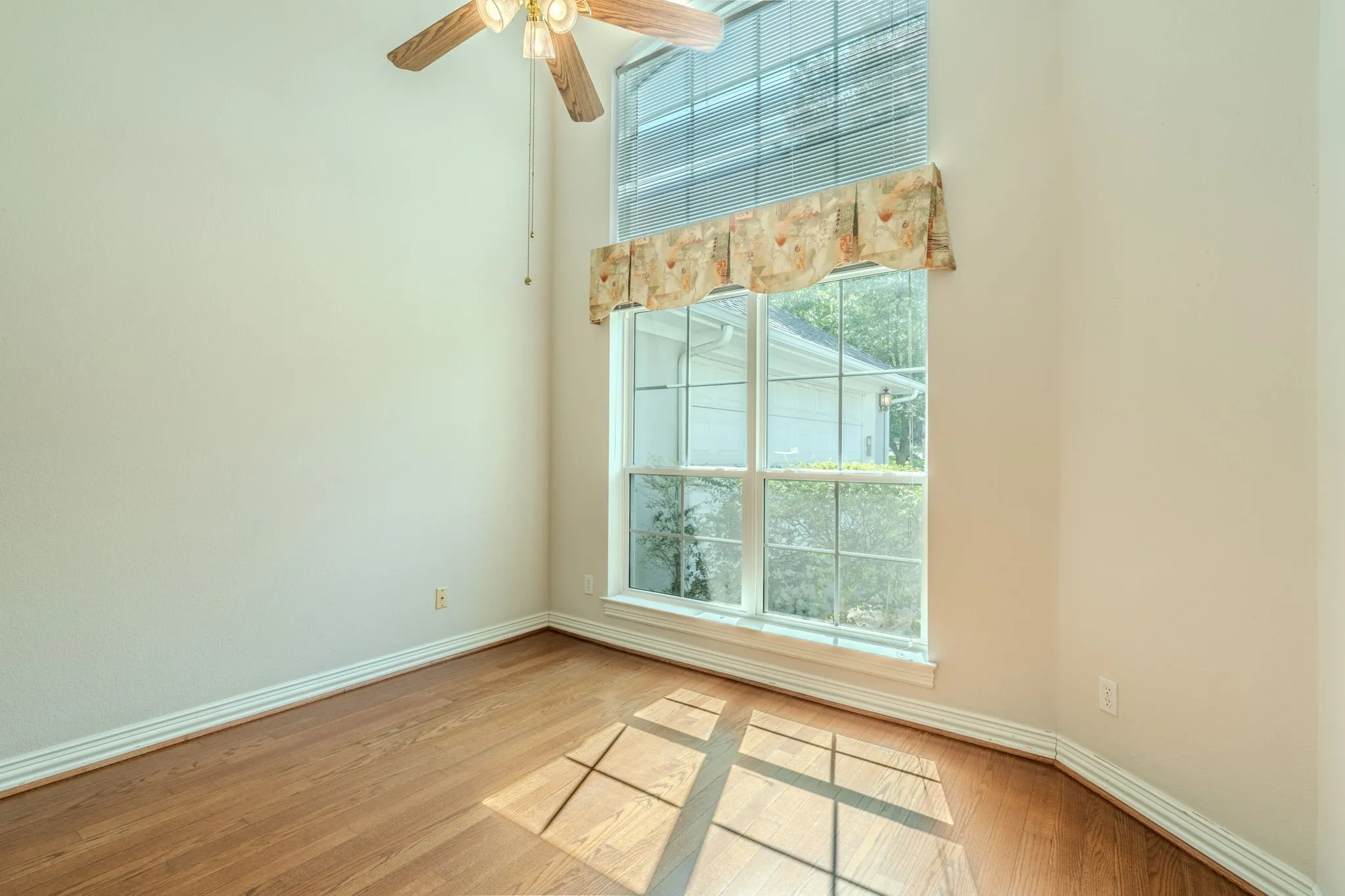 The formal dining room is just to the right of the front door.