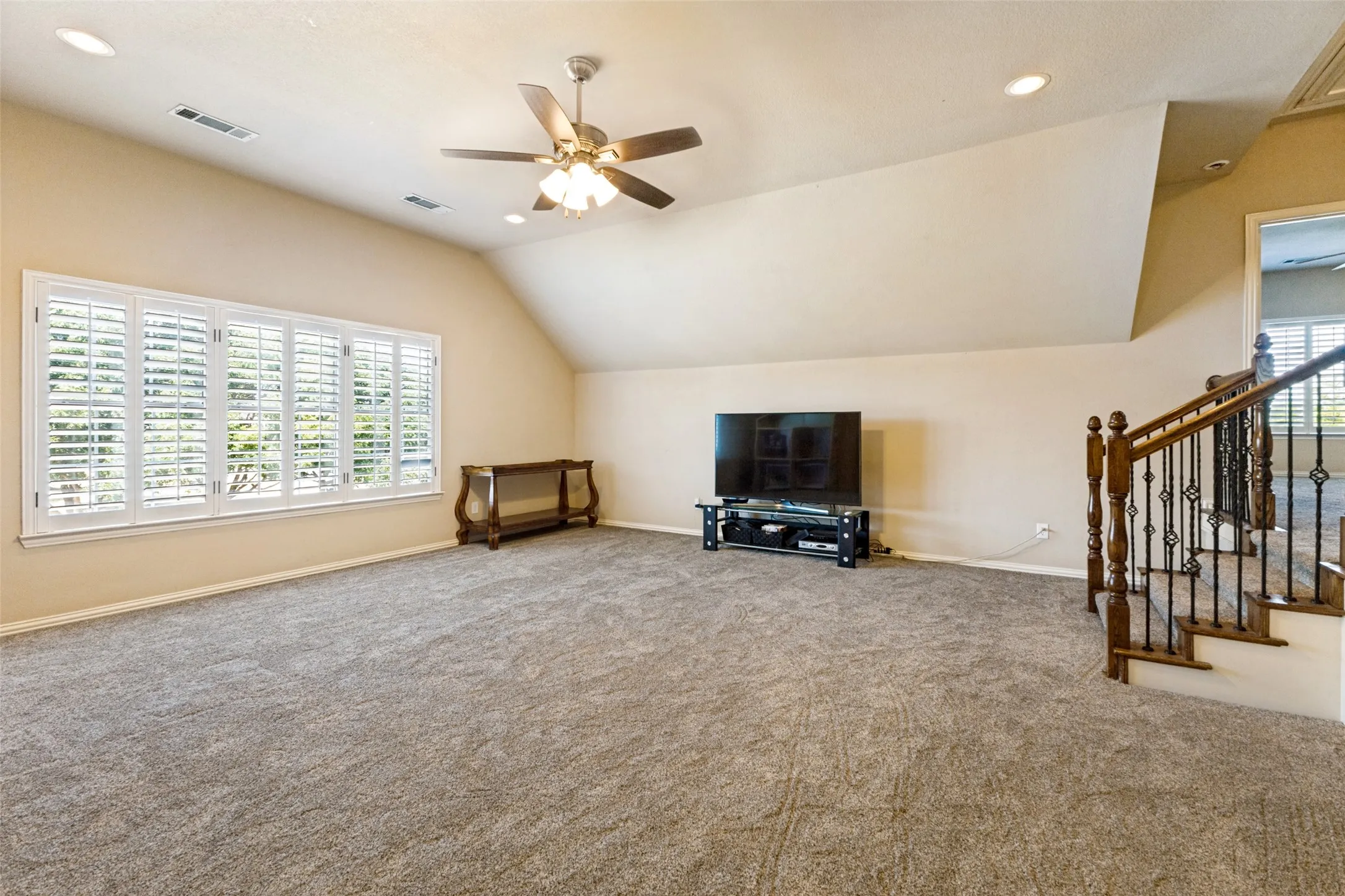 Upstairs Game Room with large storage closet (not shown in photo).