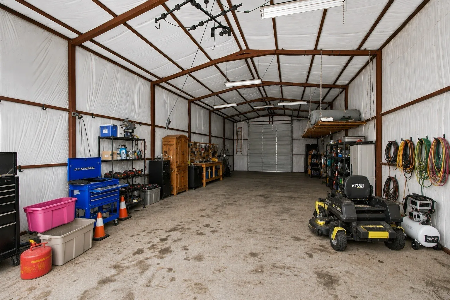Huge outbuilding, suitable for an RV, a fleet of cars or scores of toys.